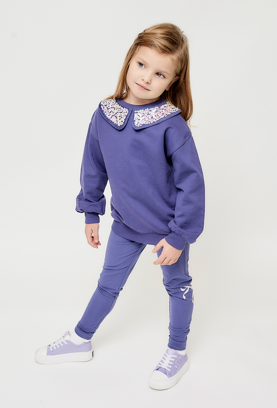 Granatowe legginsy dziewczęce z ozdobną wstążką - 510.15.