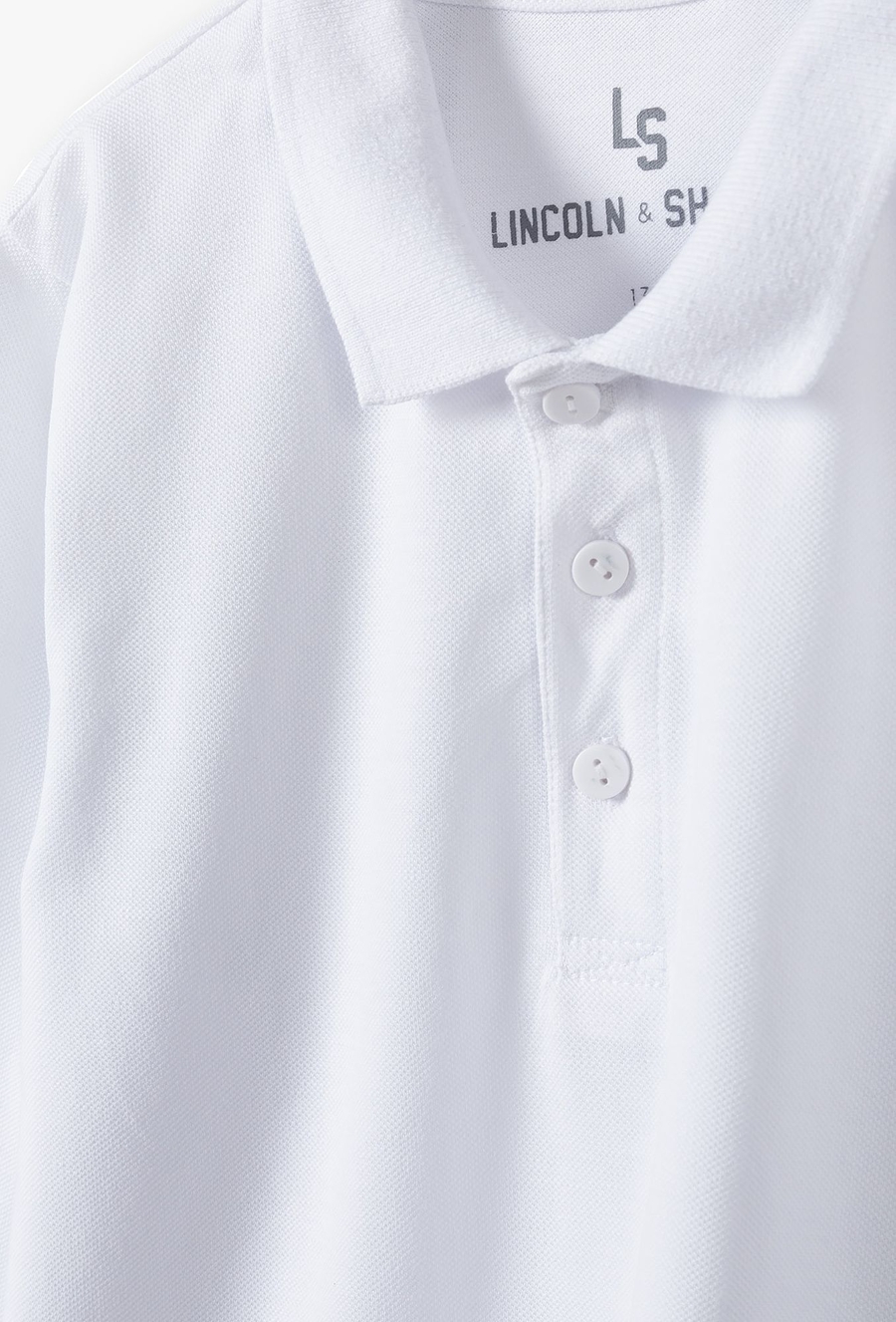 Bluzka chłopięca z długim rękawem i kołnierzykiem polo - biała