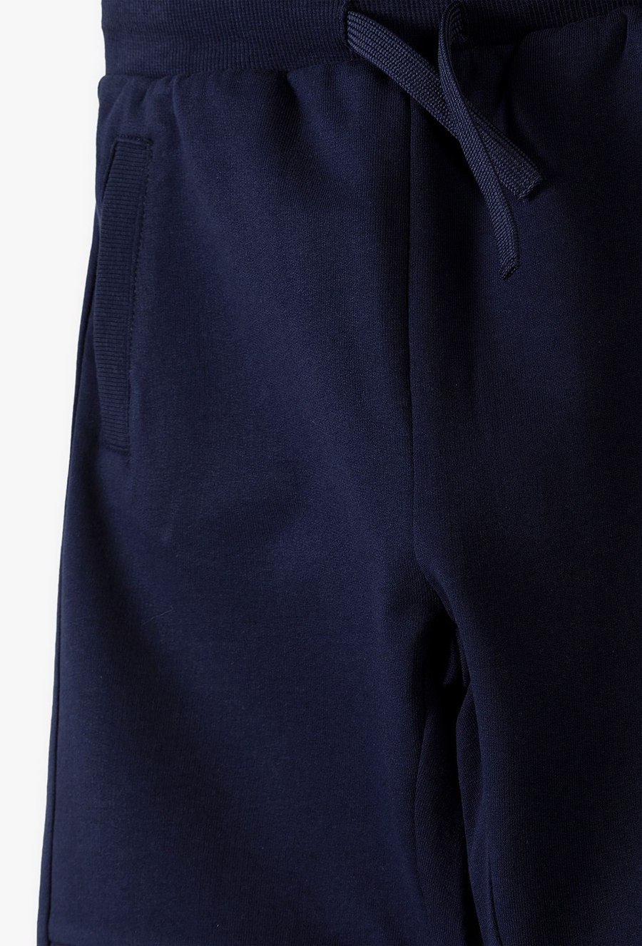 Spodnie dresowe ze wzmacnianymi kolanami - regular - 510.15.