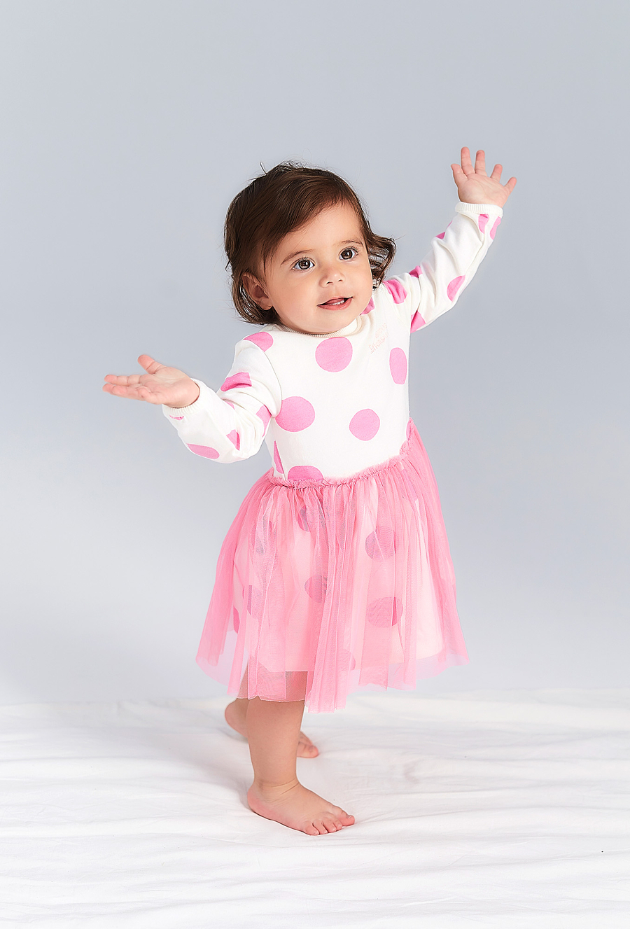 Sukienka niemowlęca w różowe grochy - długi rękaw - 510.15.