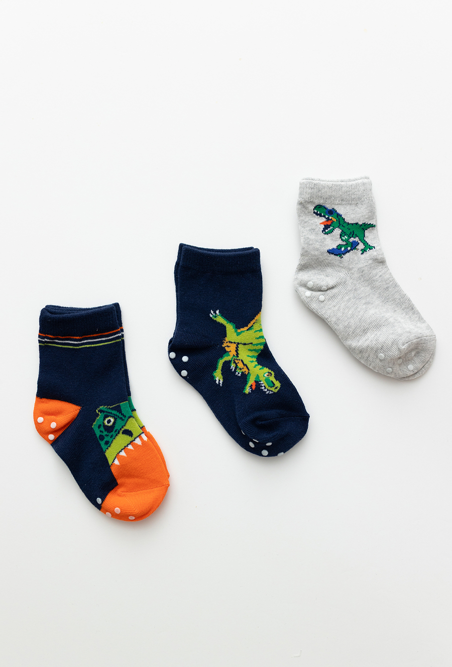 Skarpety chłopięce 3-pak z motywem dinozaurów i ABS – granatowe.