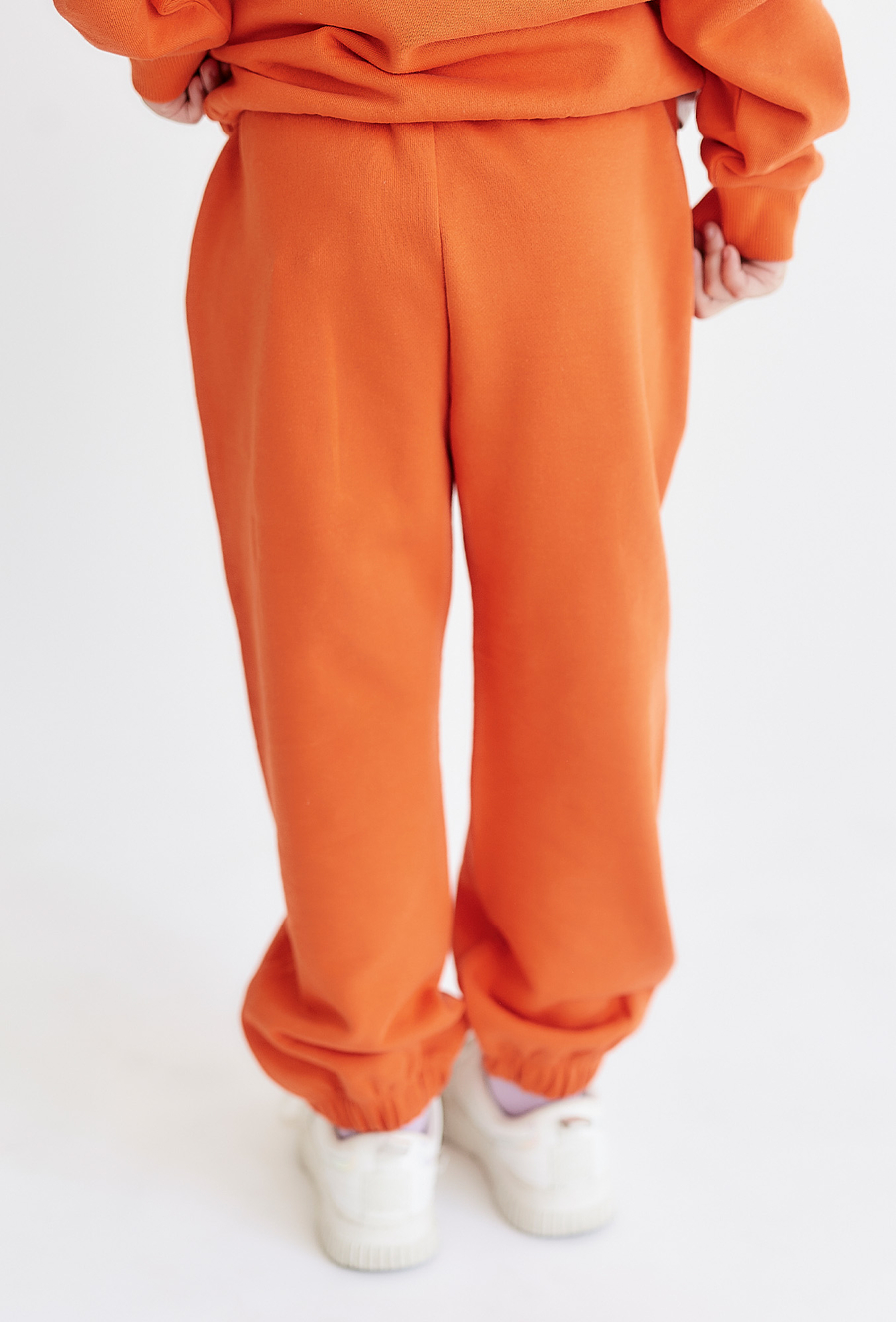 Pomarańczowe spodnie dresowe - unisex - Limited Edition