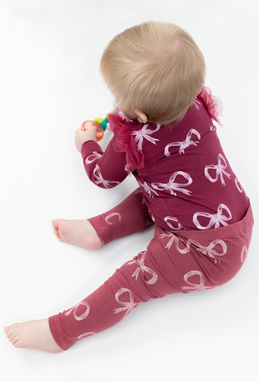 Bordowe body w kokardki z długim rękawem