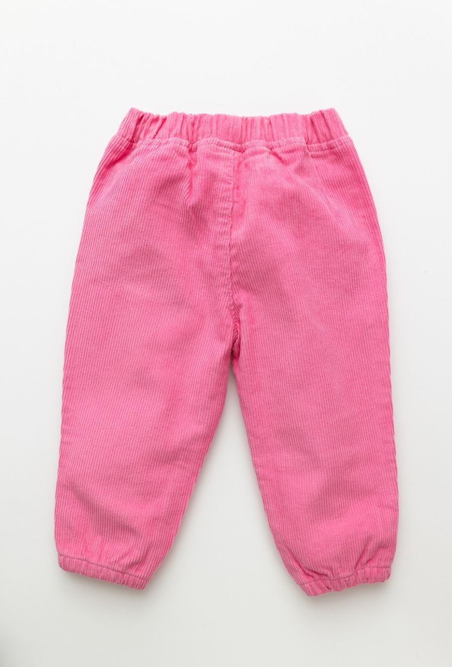 Różowe sztruksowe joggery niemowlęce z haftem