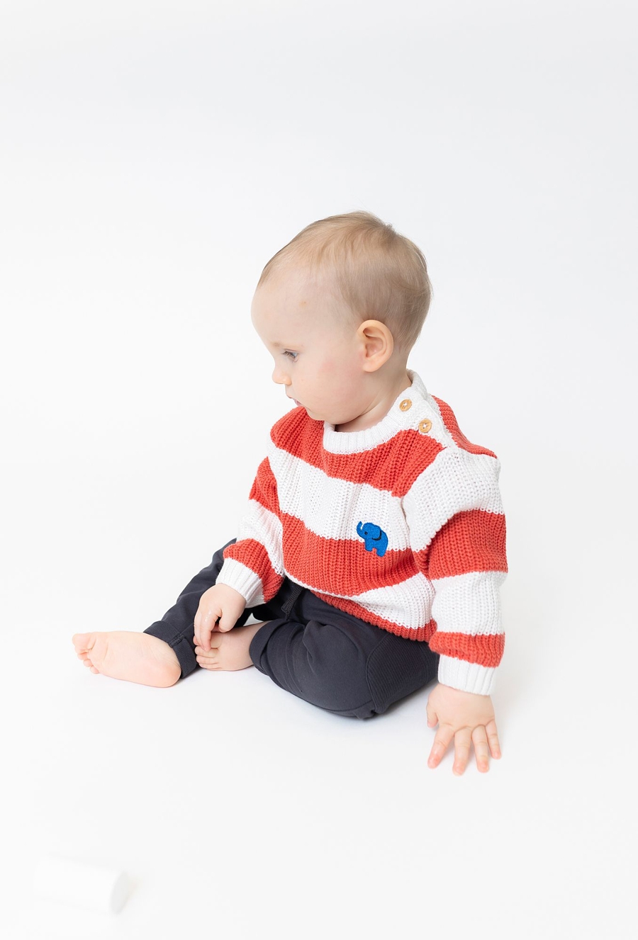 Sweter niemowlęcy w paski