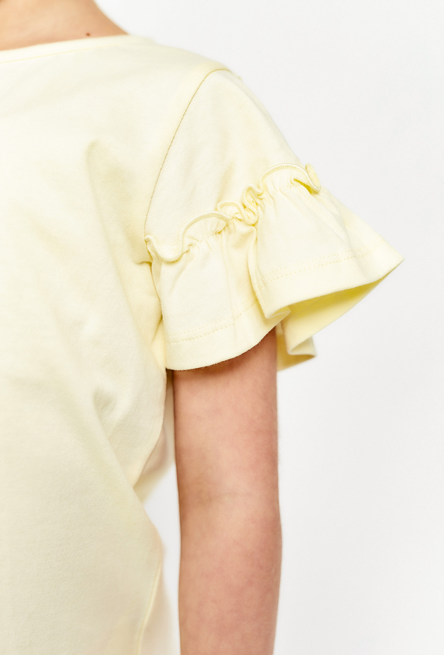 Koszulka z kokardką i falbankami