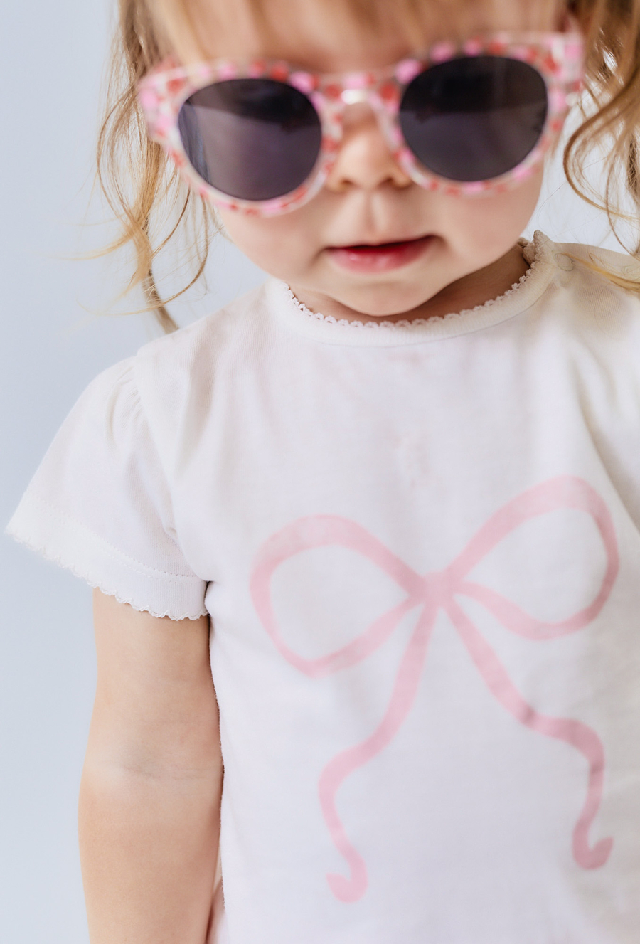 Koszulka z różową kokardką