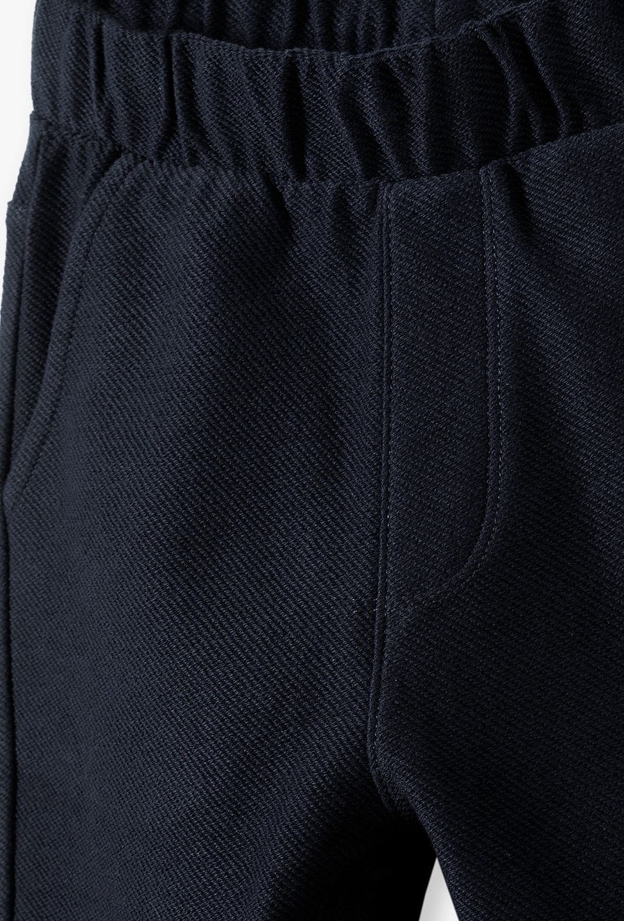 Dzianinowe granatowe spodnie dla chłopca - 510.15.