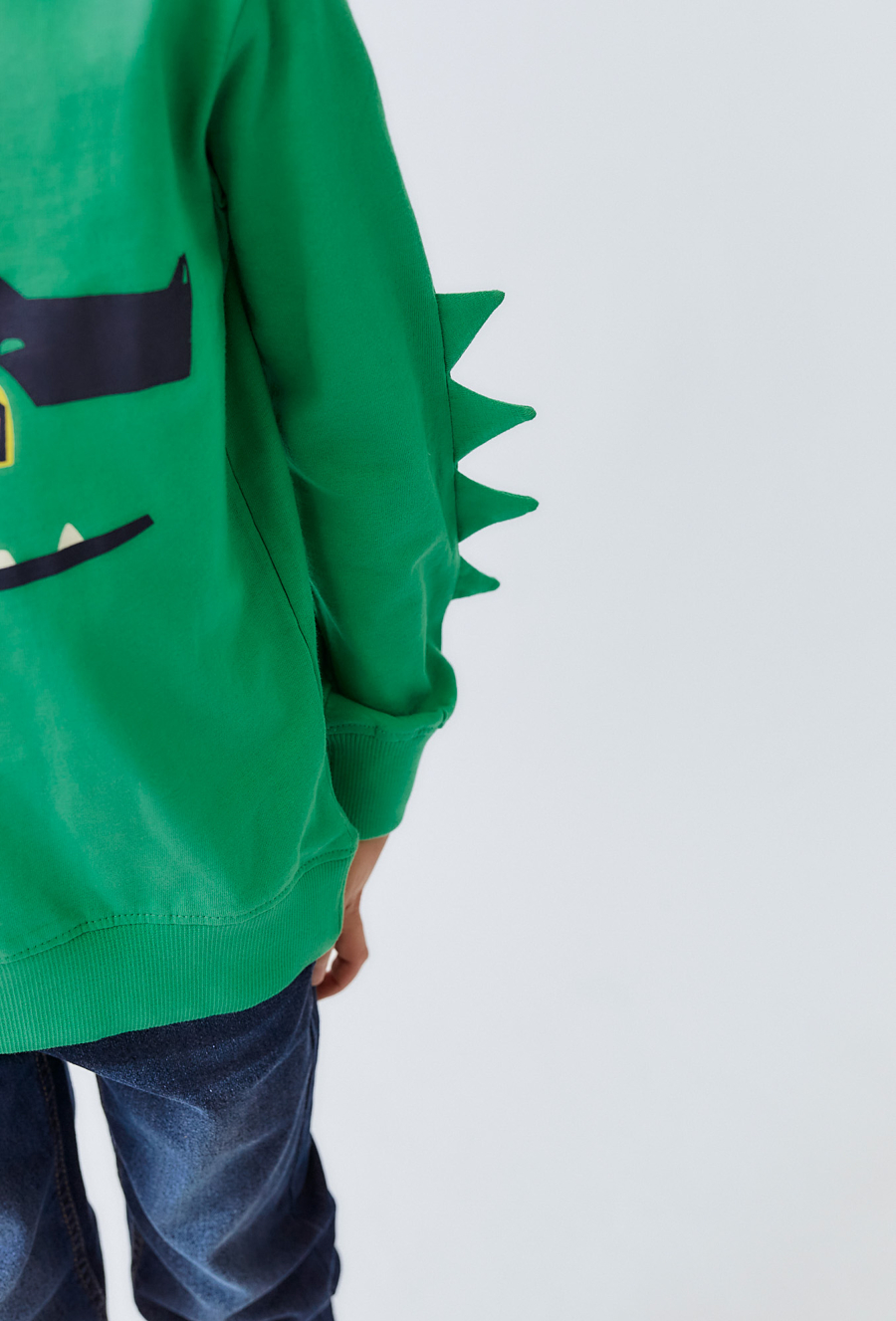 Zielona bluzka dziecięca z nadrukiem okodyla