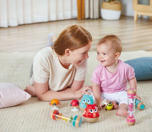 Музикална играчка Hape - Бухал, червен