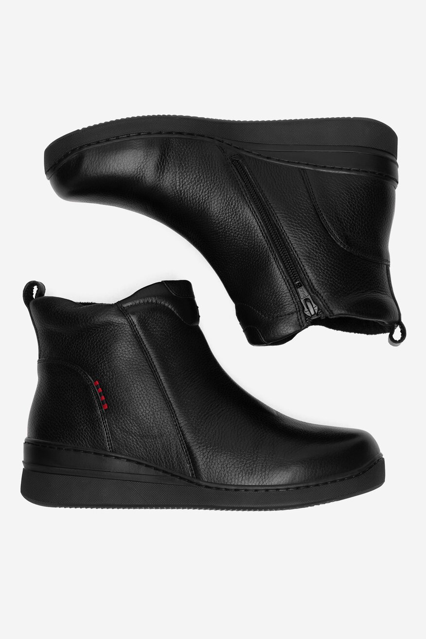 Botki skórzane na koturnie