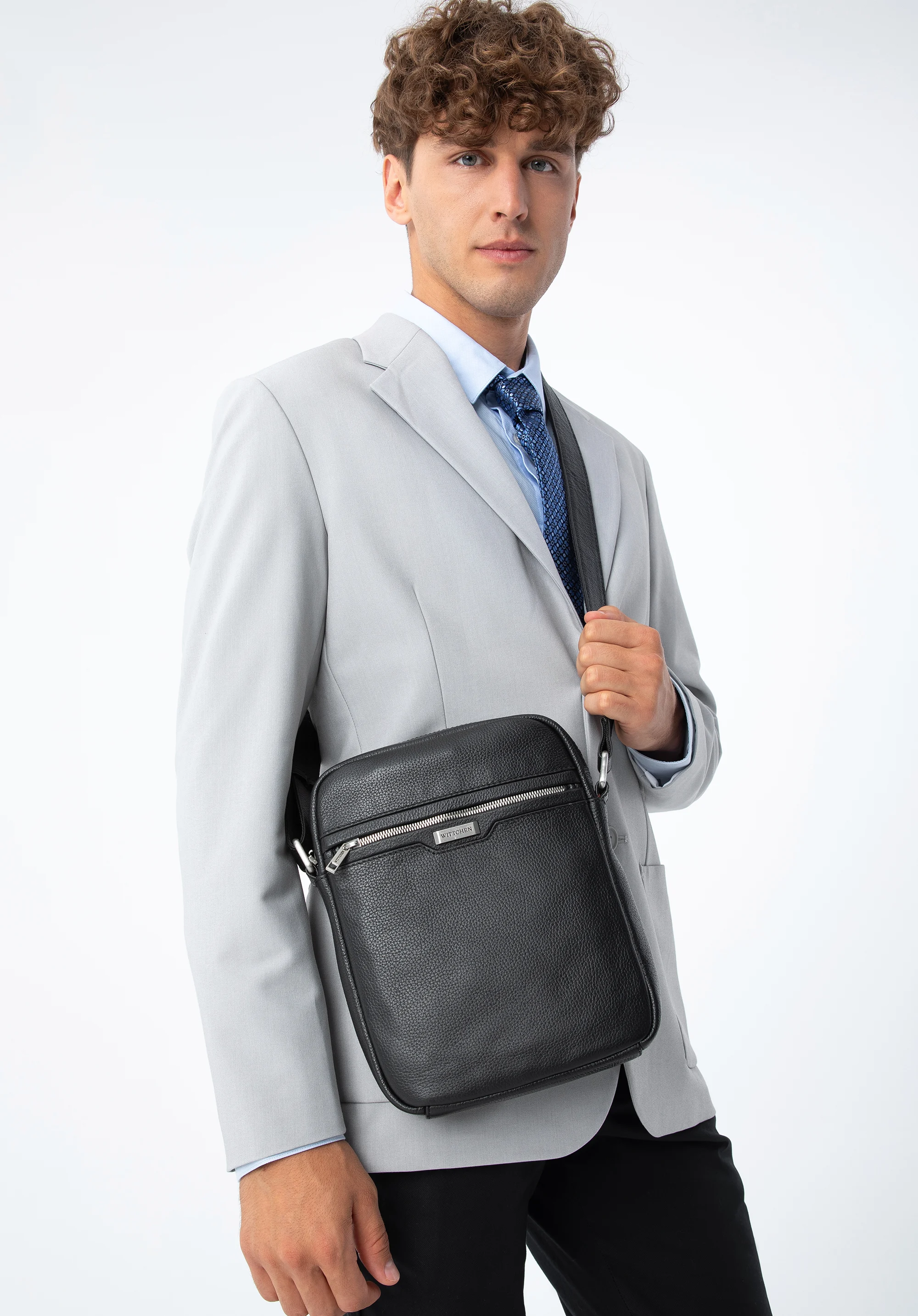 Męska listonoszka skórzana z kieszenią na suwak