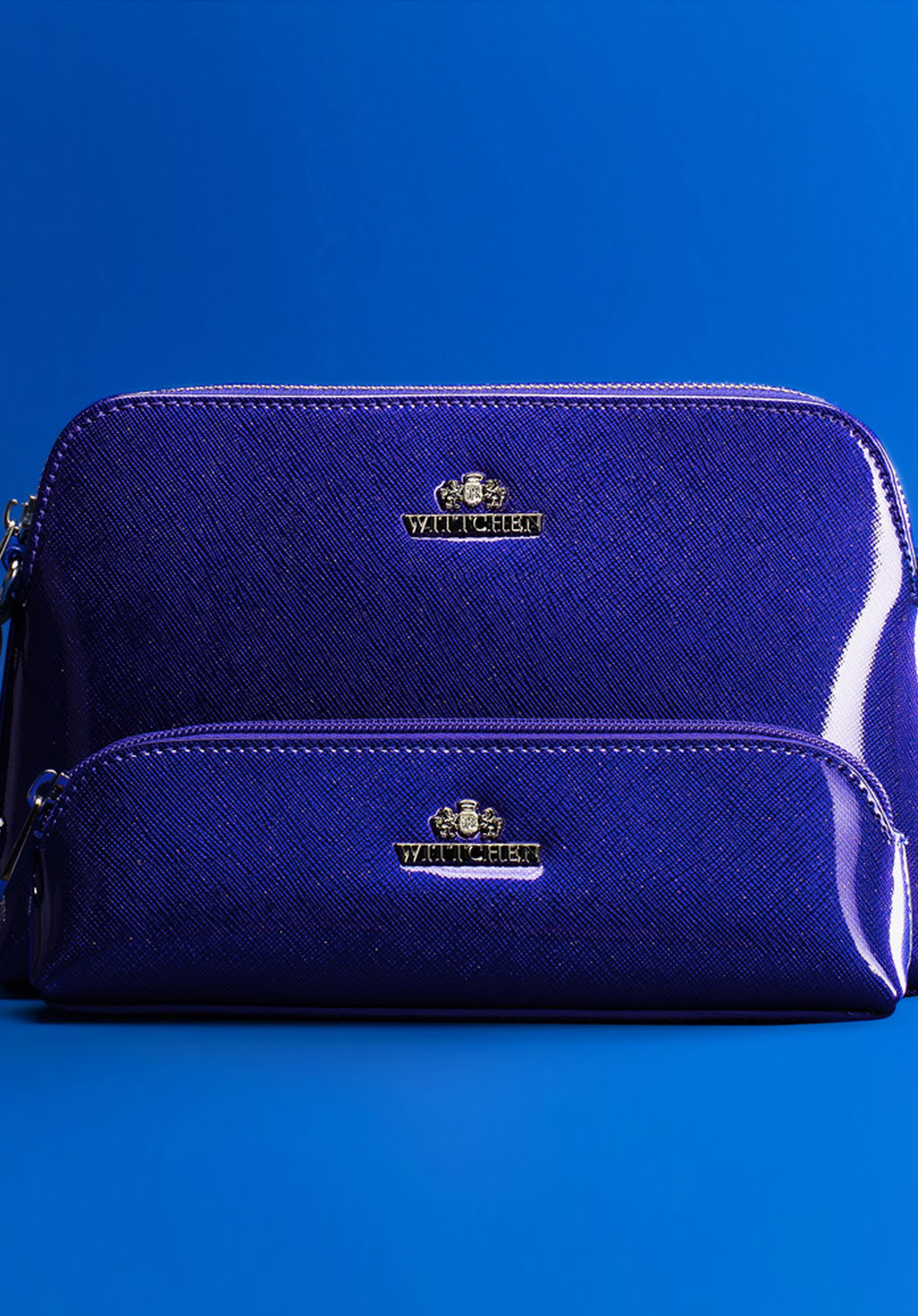 Damska listonoszka skórzana lakierowana zaokrąglona