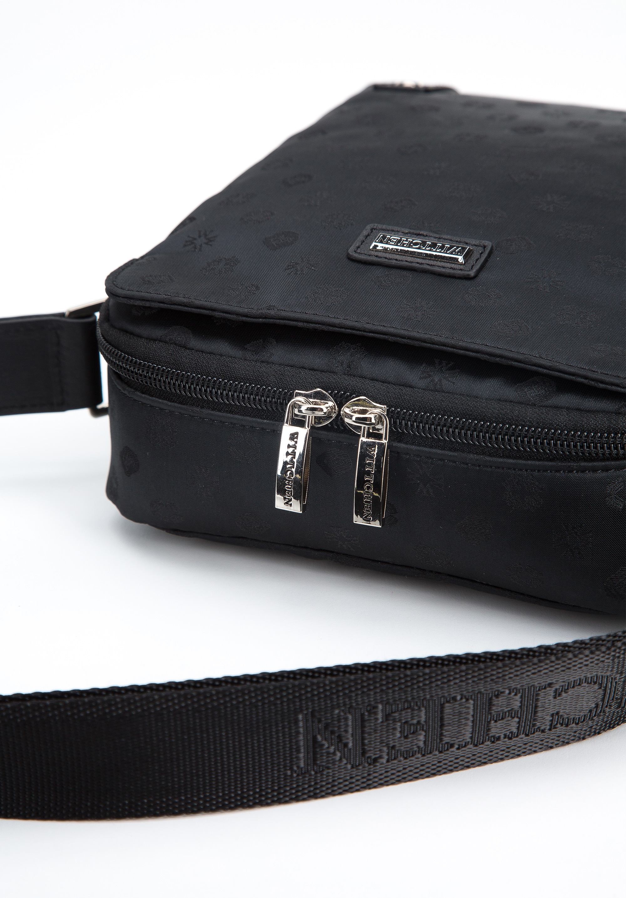 Damska torebka żakardowa z opaskami ze skóry pionowa