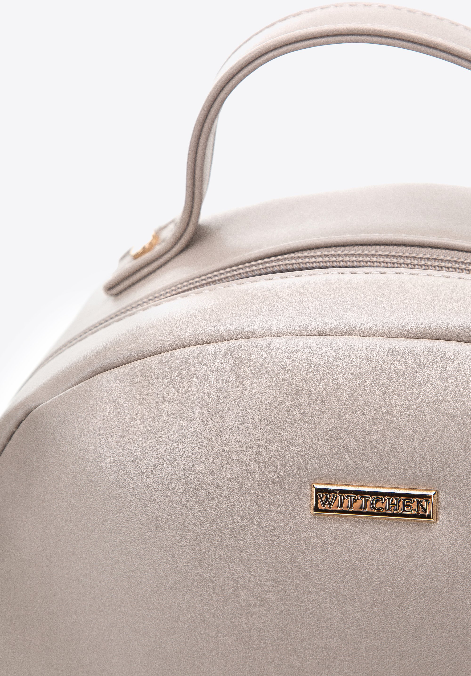 Damski plecak z ekoskóry z obszytą kieszenią z przodu