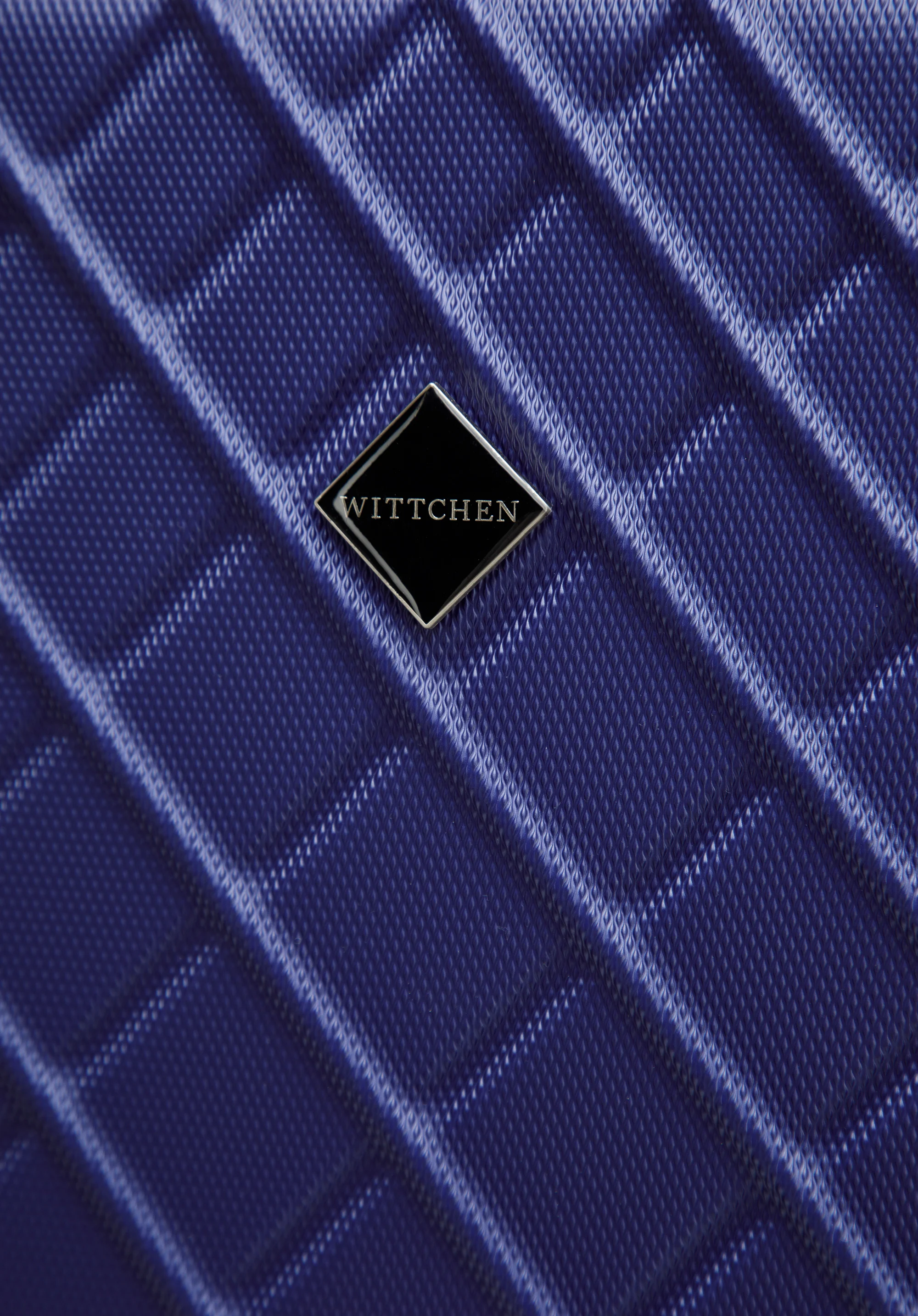 Średnia walizka z ABS-u w ukośną kratkę