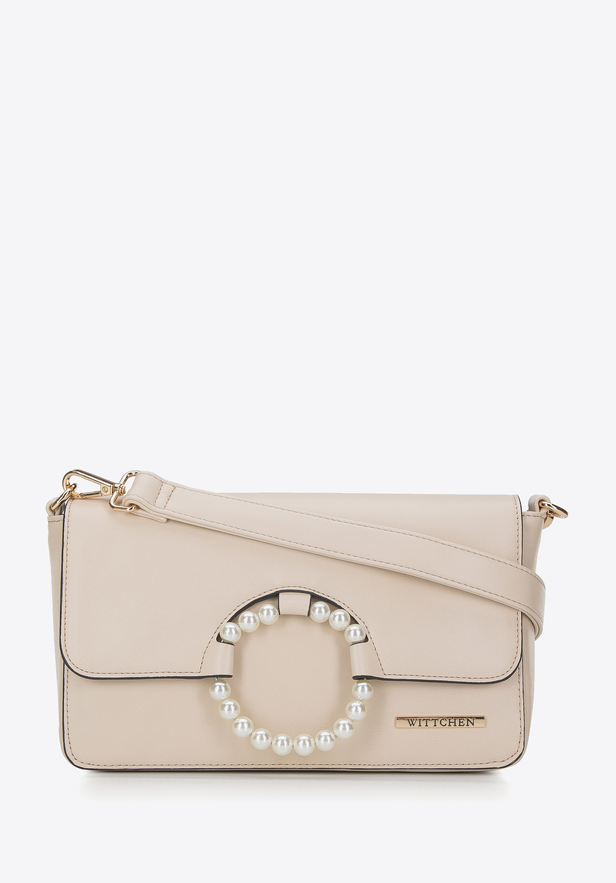 Damska torebka z kółkiem na klapie