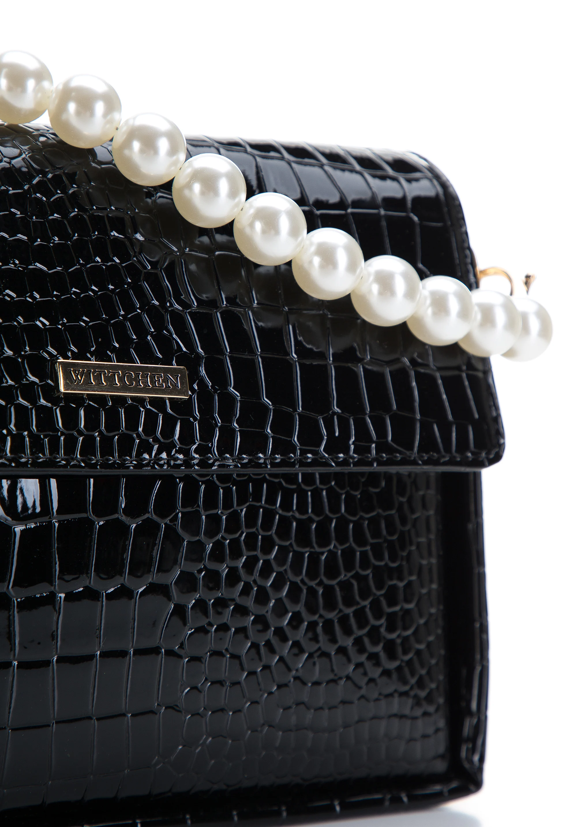 Damska minitorebka z rączką z koralików