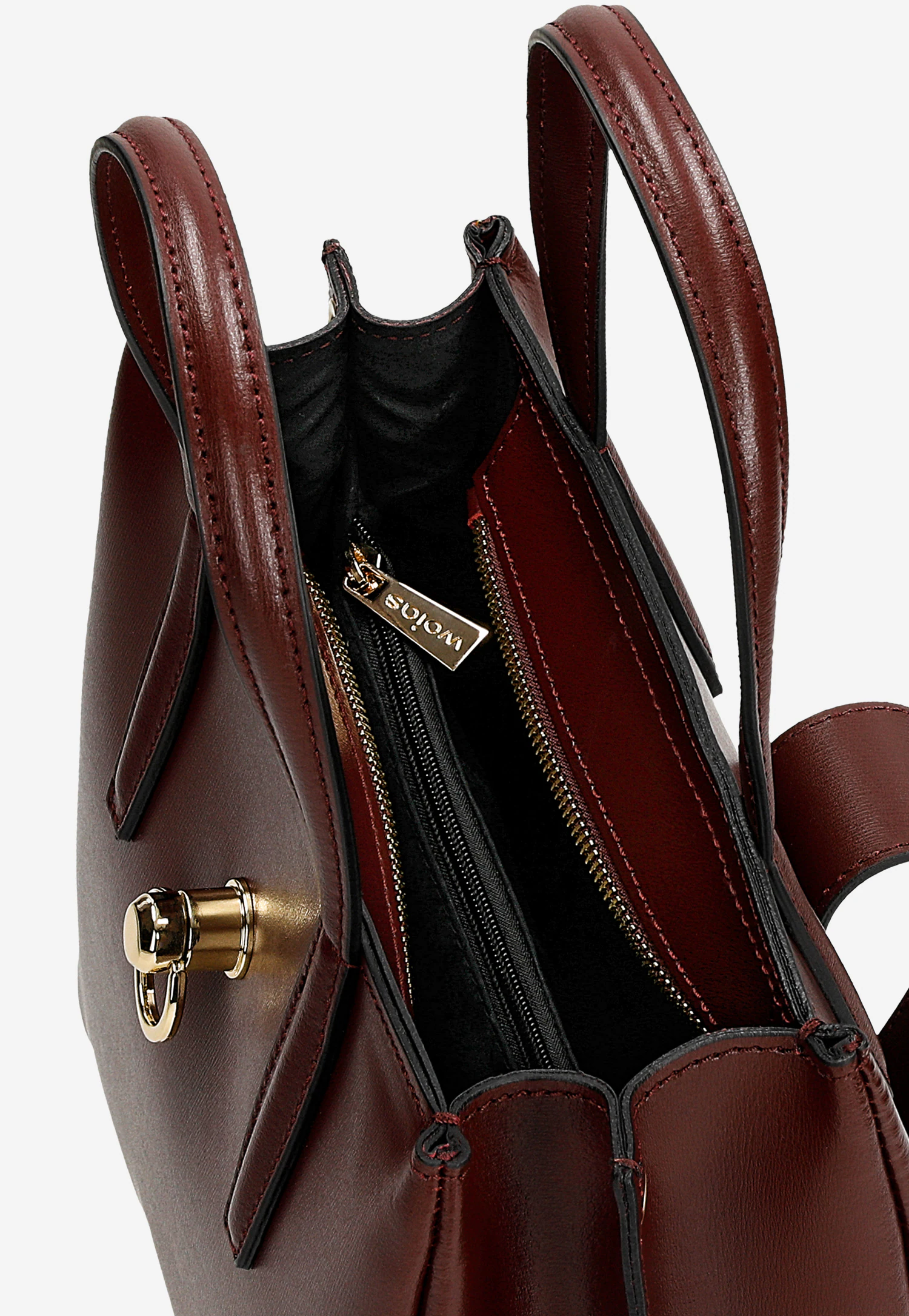 Bordowy skórzany kuferek ze złotym zapięciem