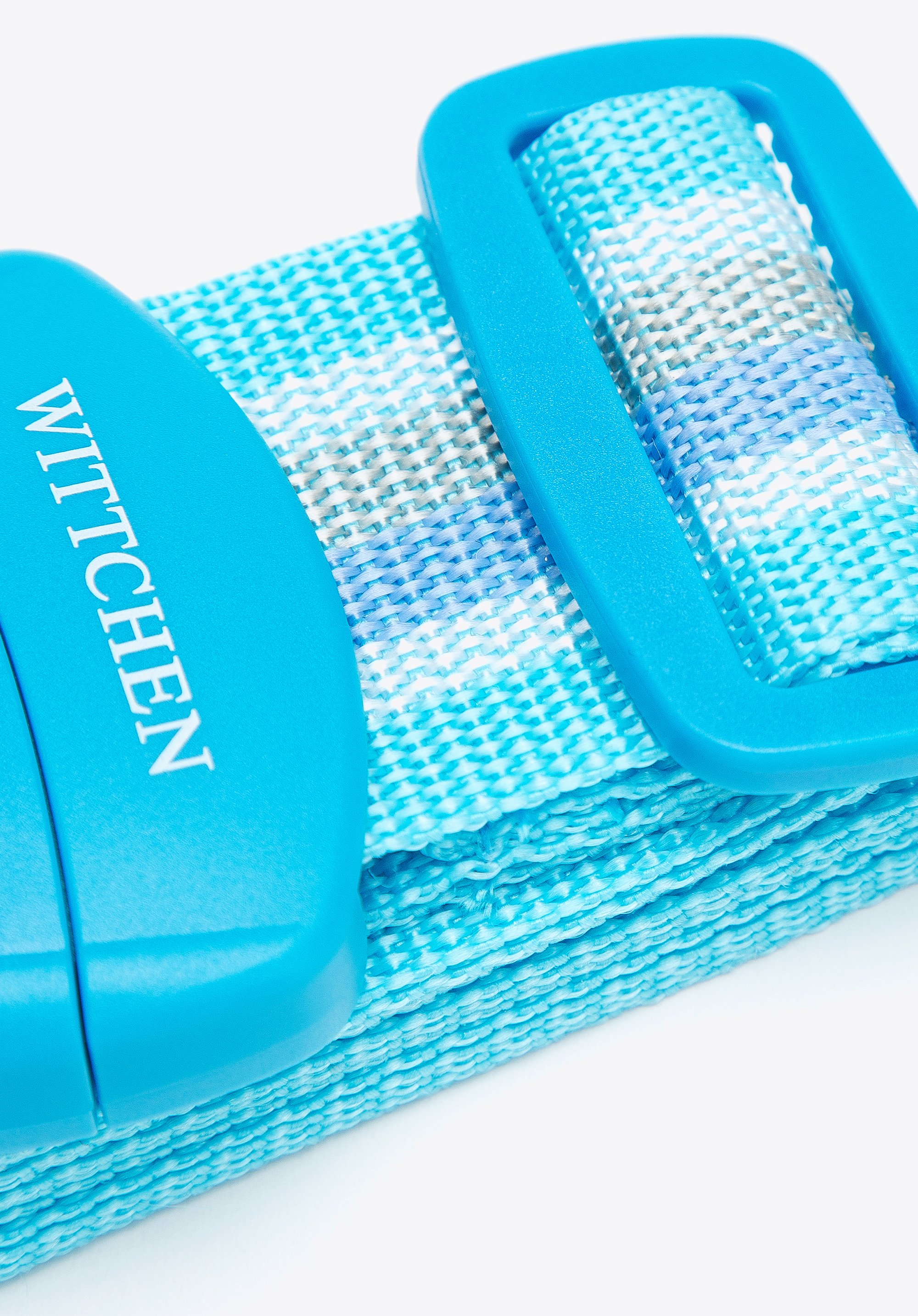 Pas zabezpieczający bagaż z zamkiem