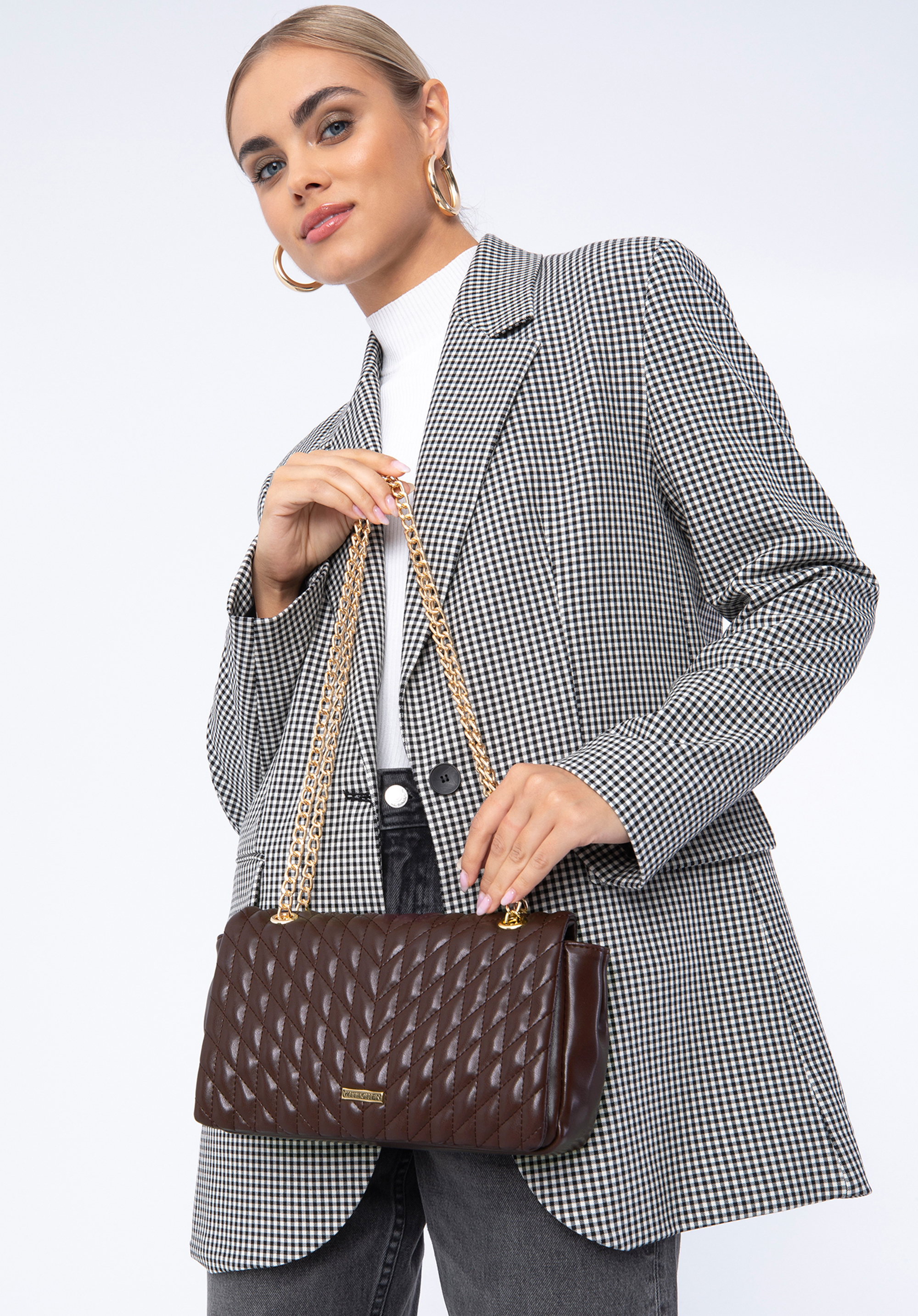 Damska torebka pikowana w jodełkę