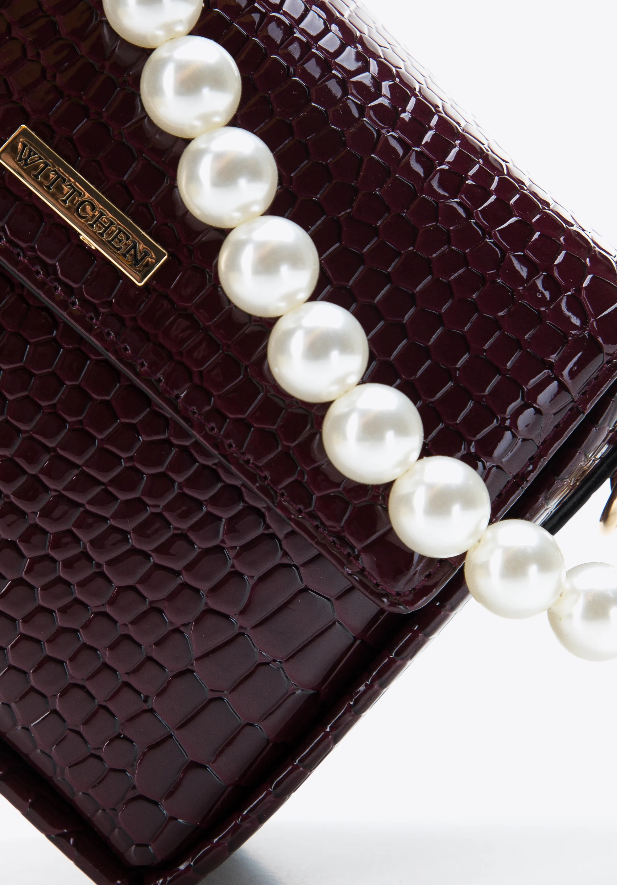 Damska minitorebka z rączką z koralików