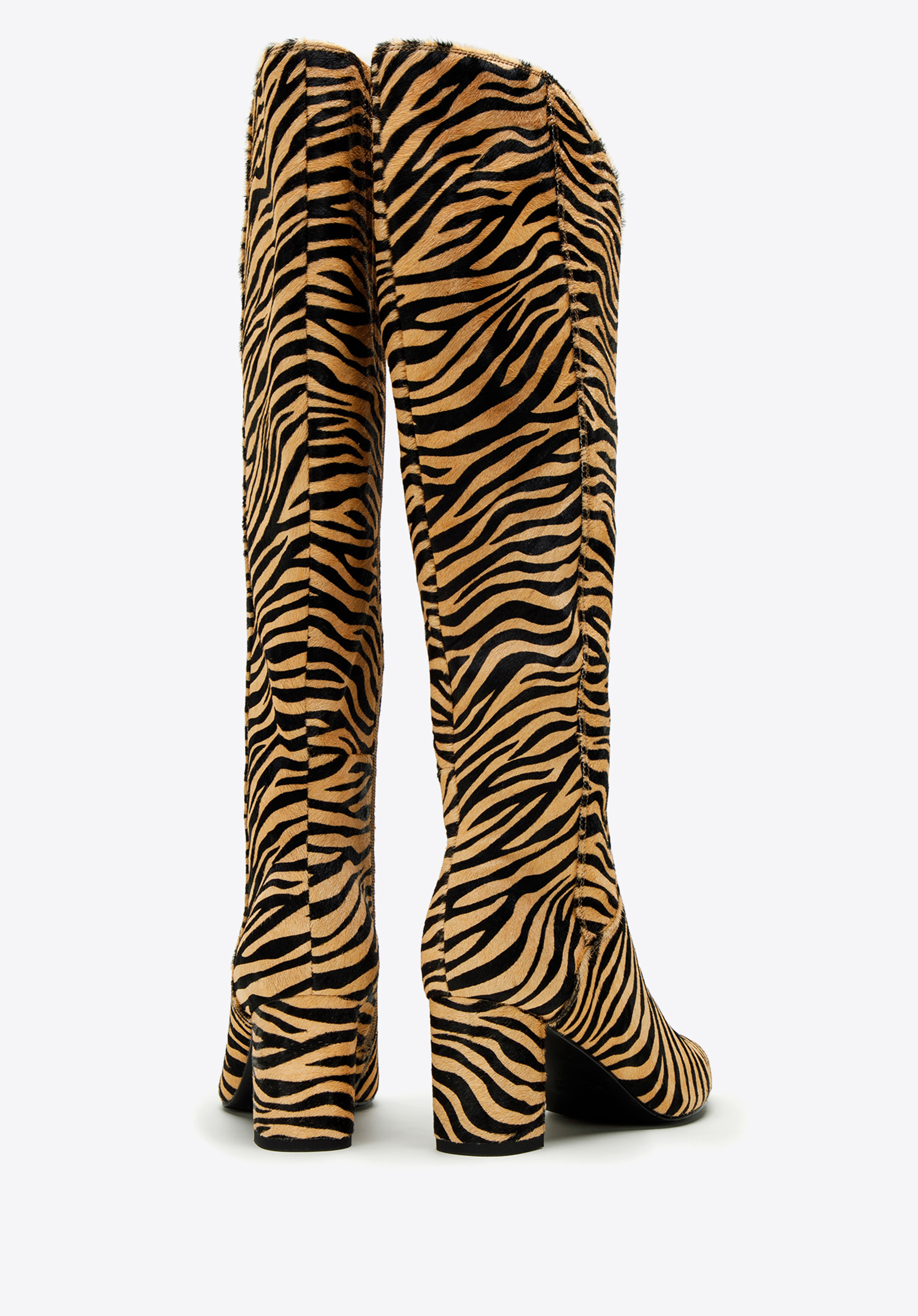 Damskie kozaki ze skóry z włosiem w zwierzęcy wzór