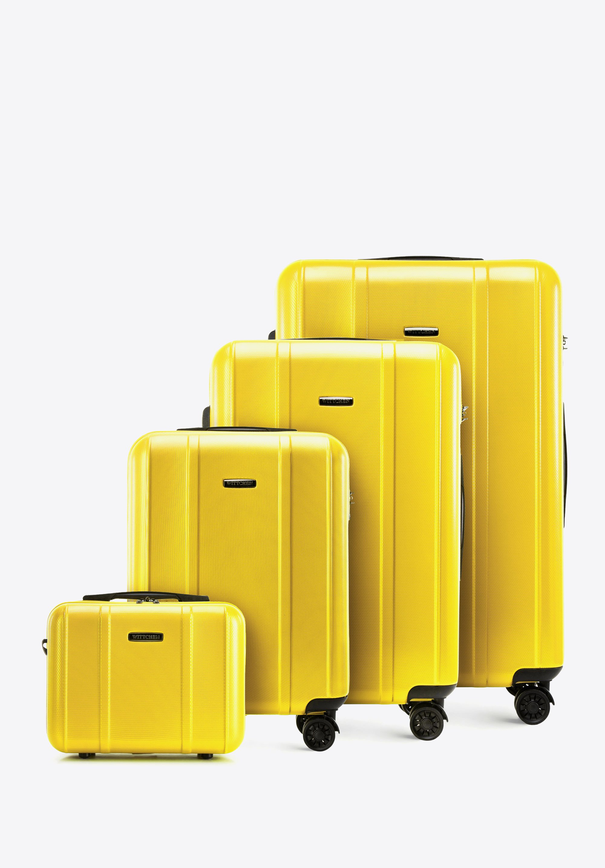 Walizka kabinowa z polikarbonu z pionowymi tłoczeniami