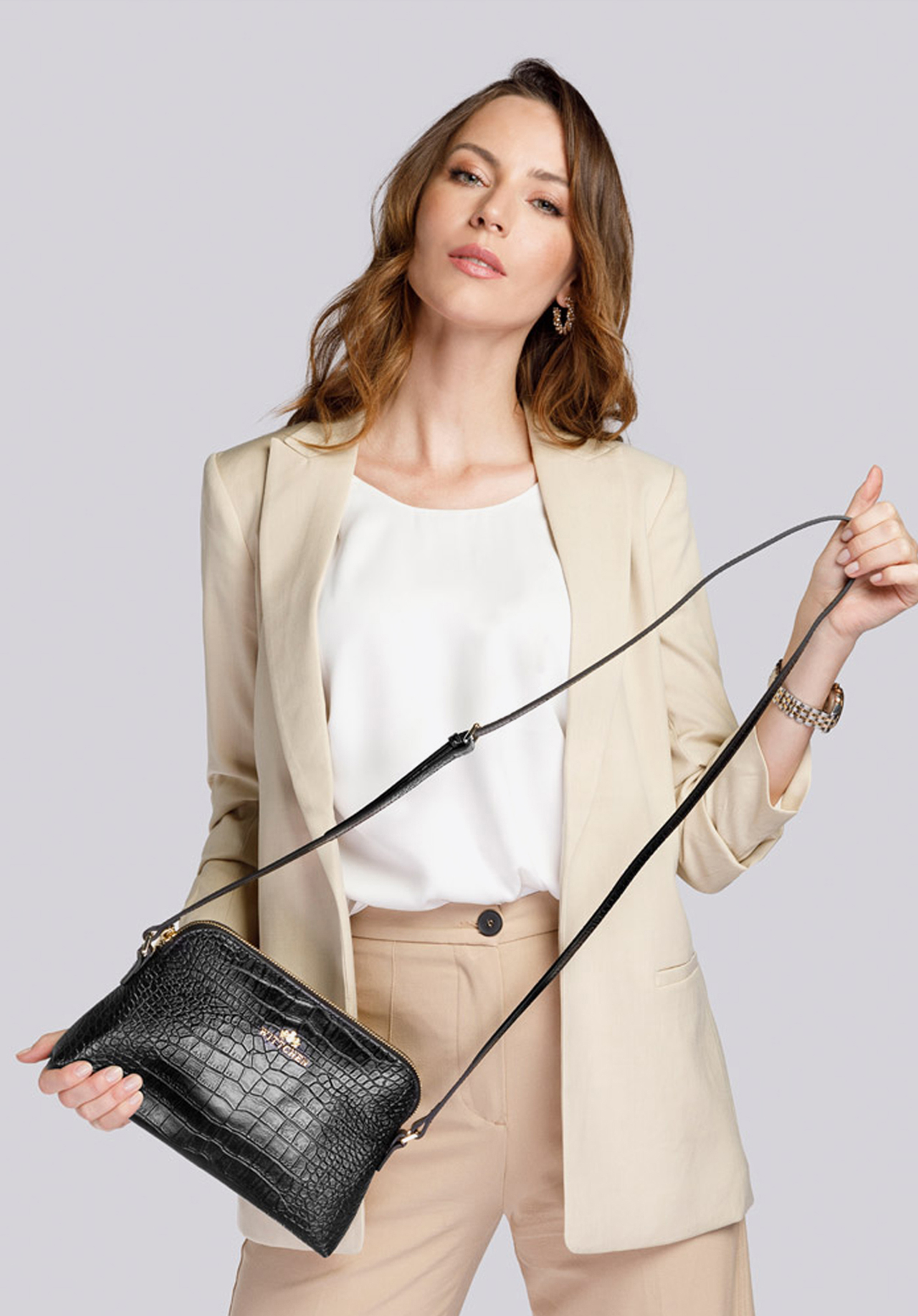 Damska listonoszka skórzana trapezowa