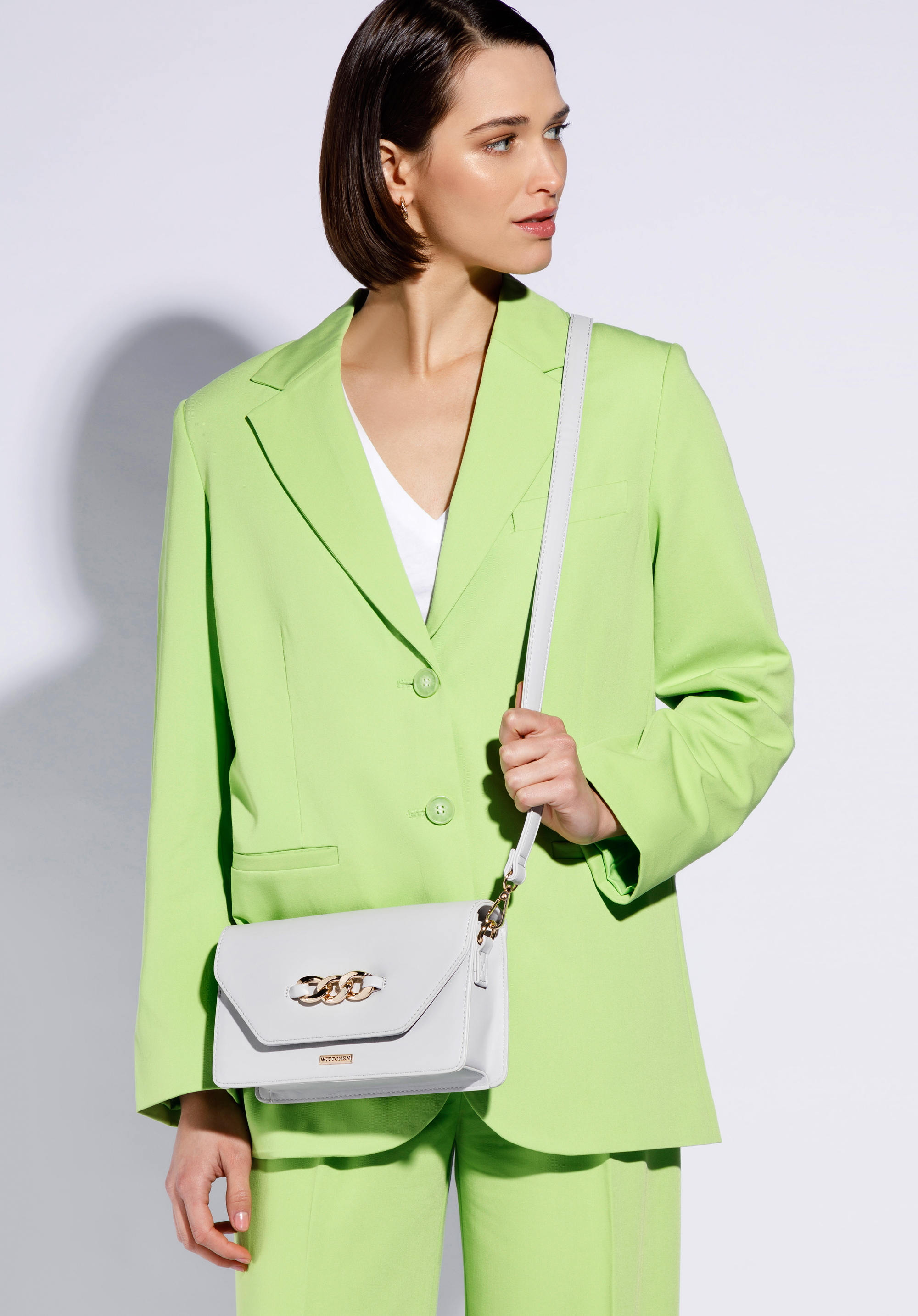 Damska listonoszka z łańcuchem na klapie