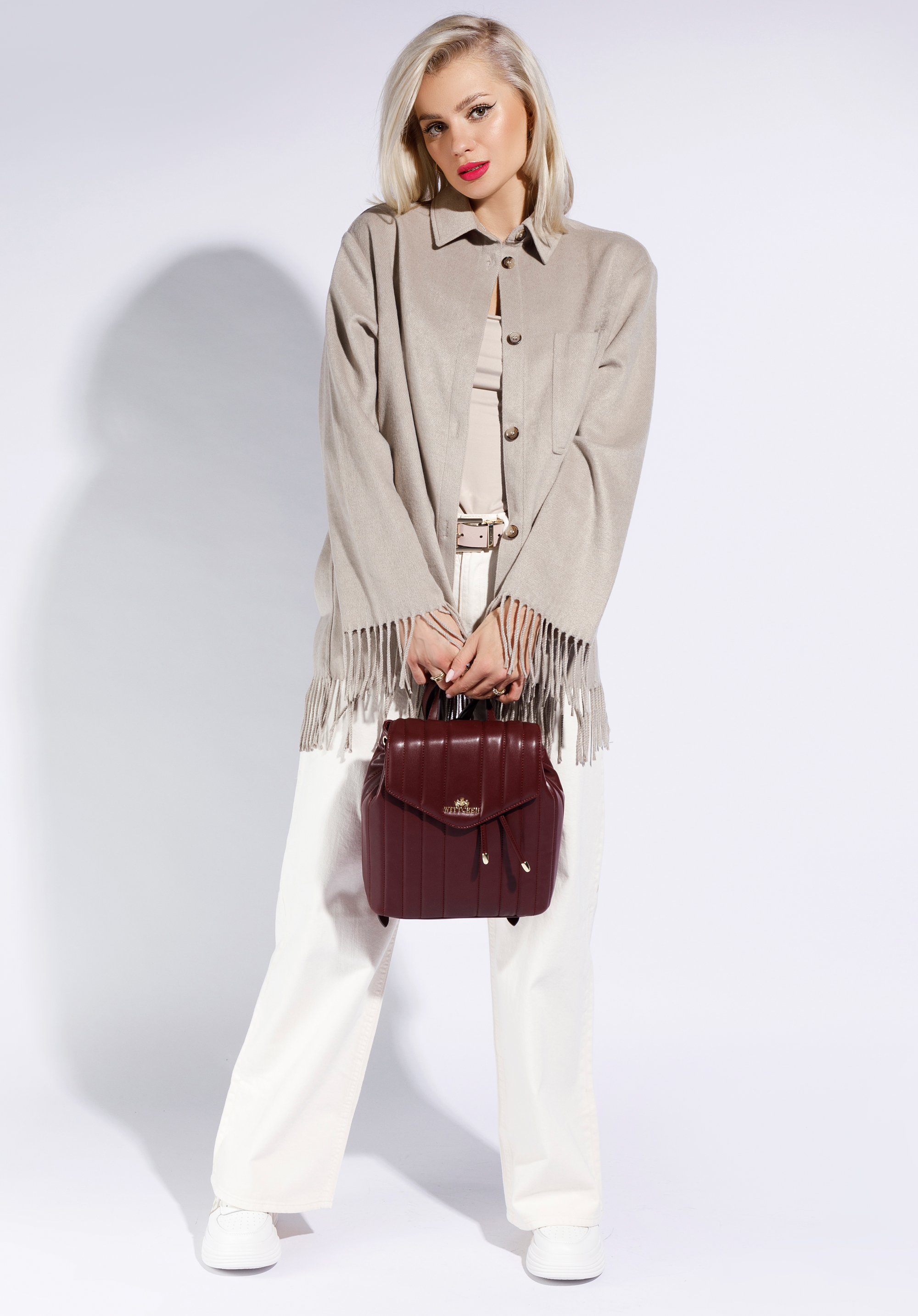 Damski plecak worek skórzany z podłużnym pikowaniem