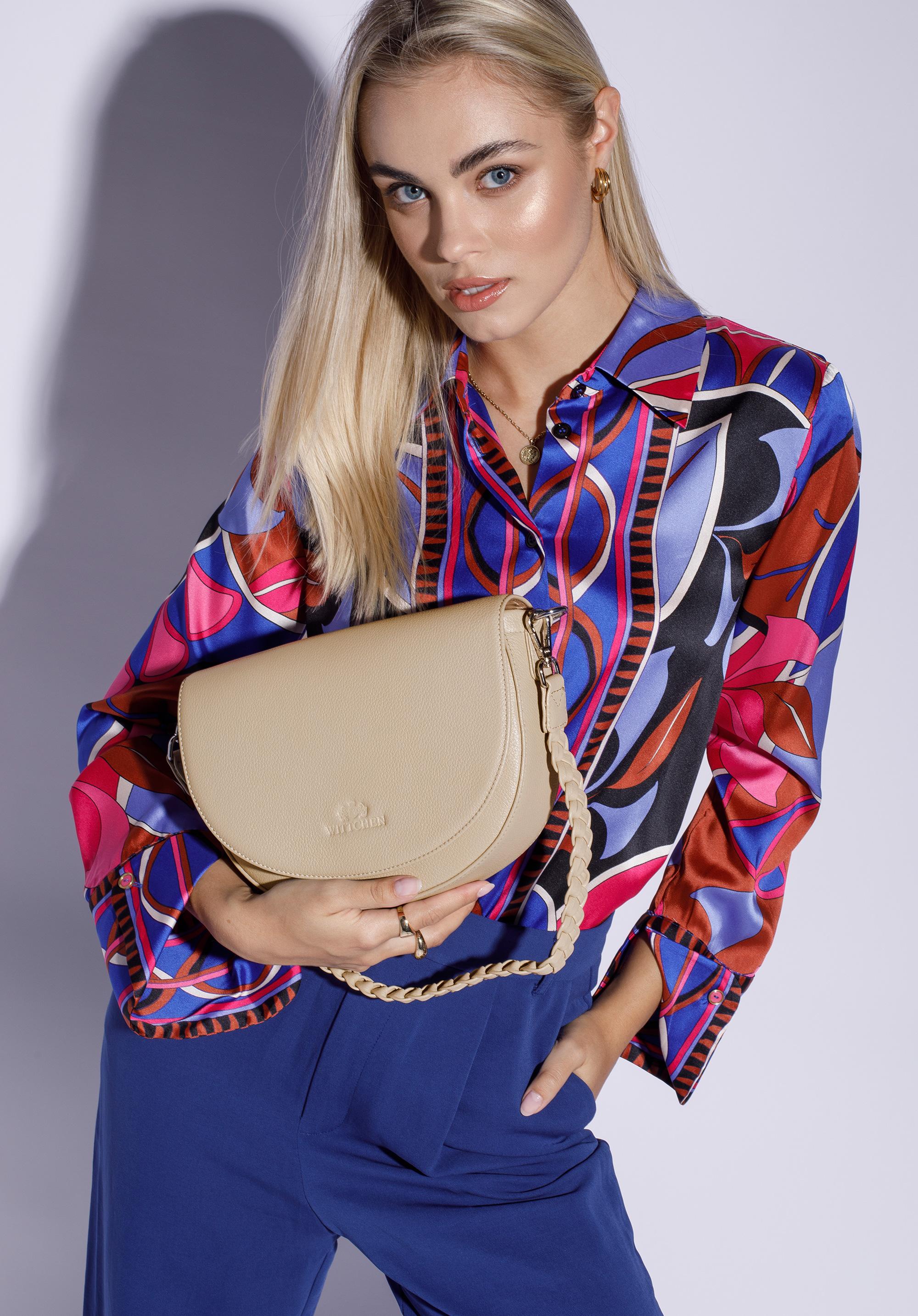 Torebka saddle bag skórzana z plecionym paskiem