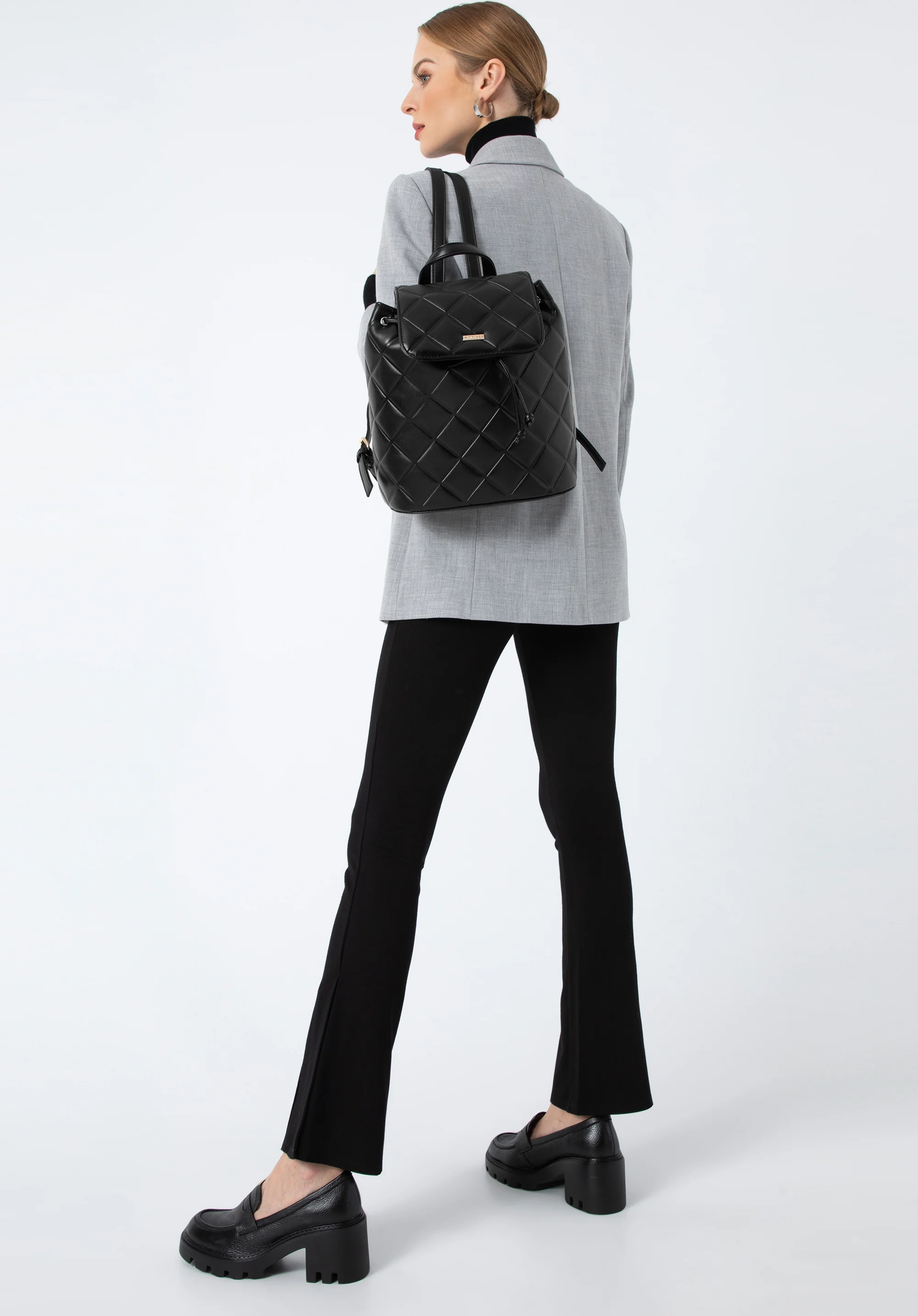 Damski plecak worek z geometrycznie pikowanej ekoskóry