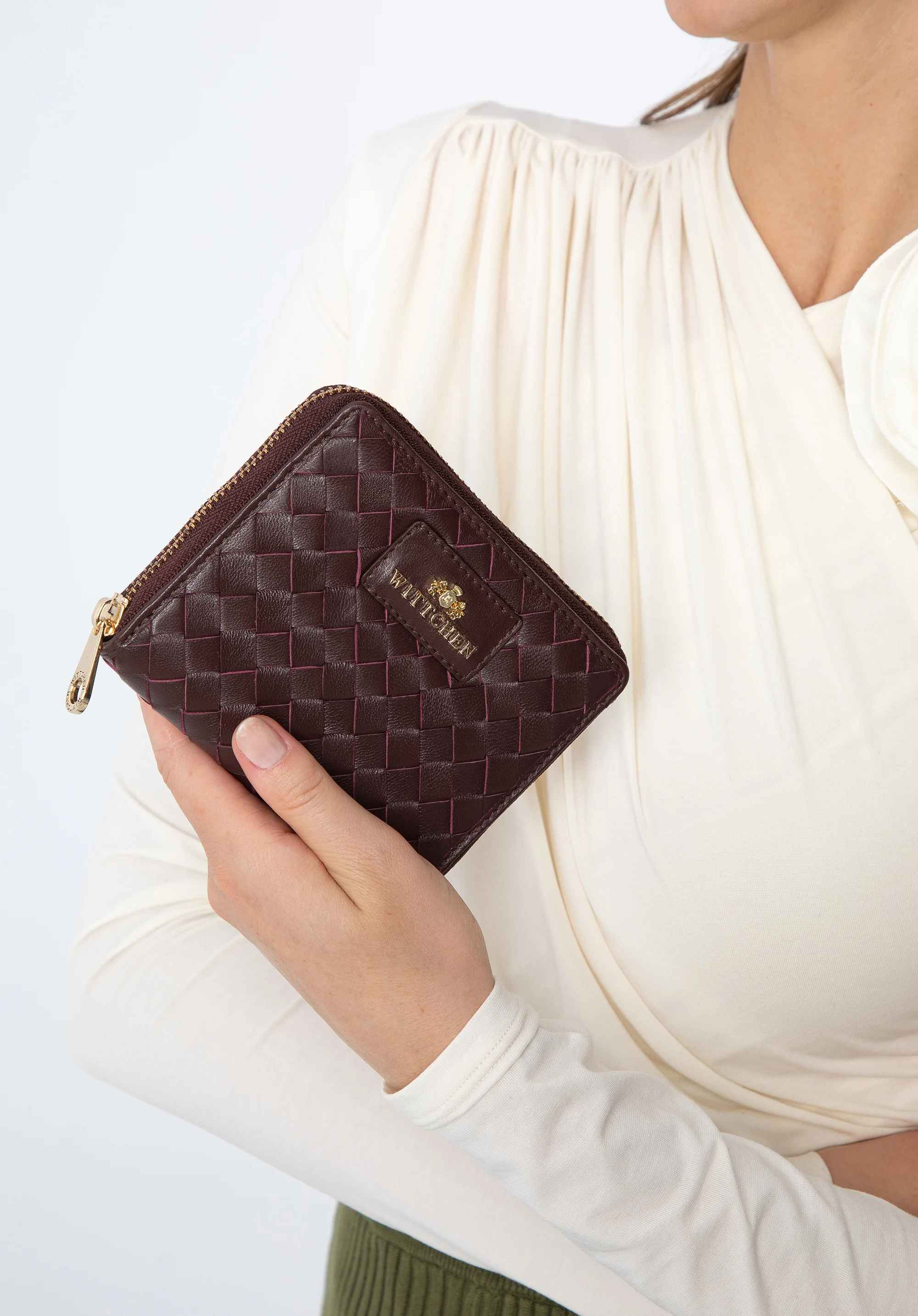 Damski portfel ze skórzanej plecionki mały