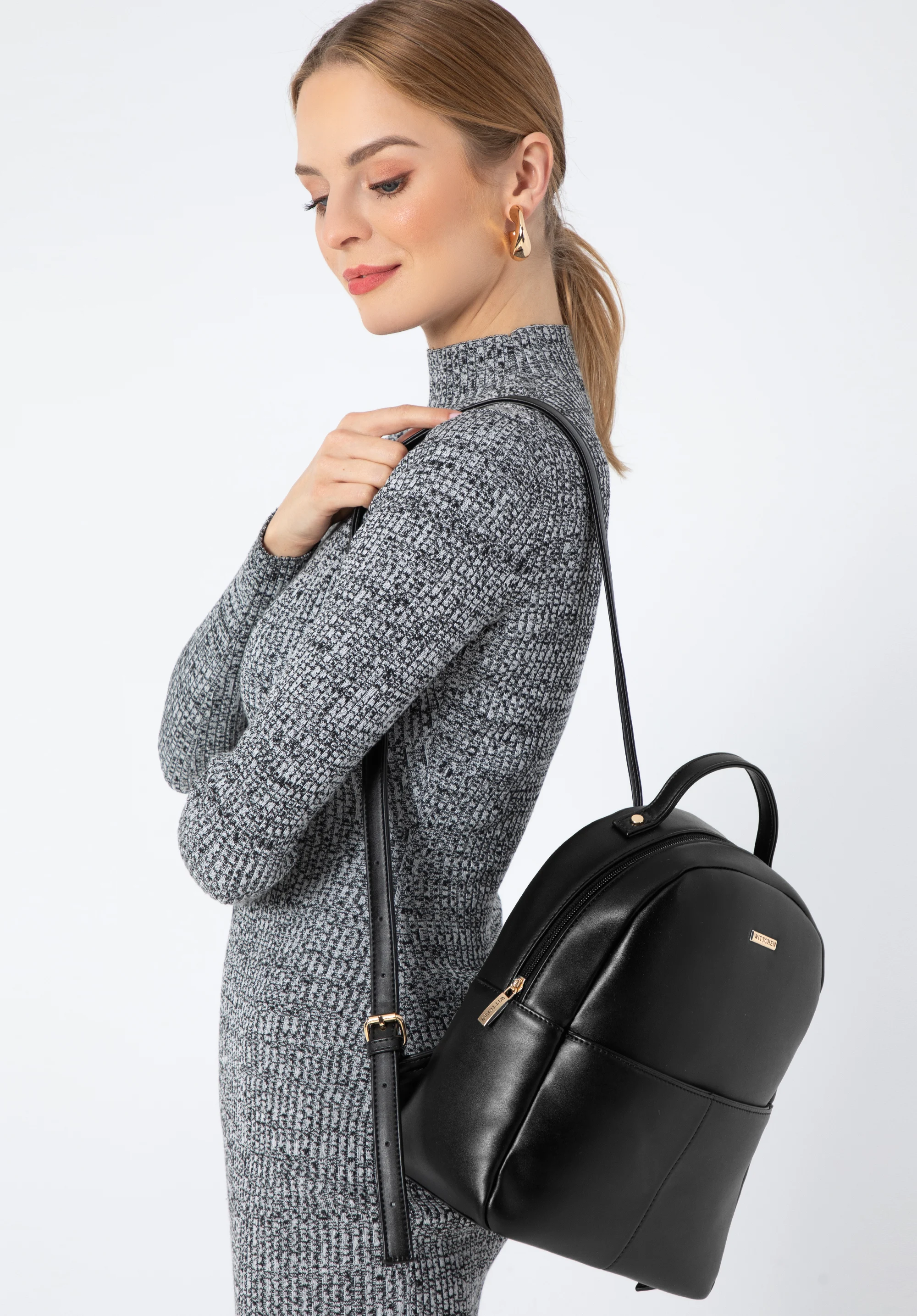 Damski plecak z ekoskóry z obszytą kieszenią z przodu