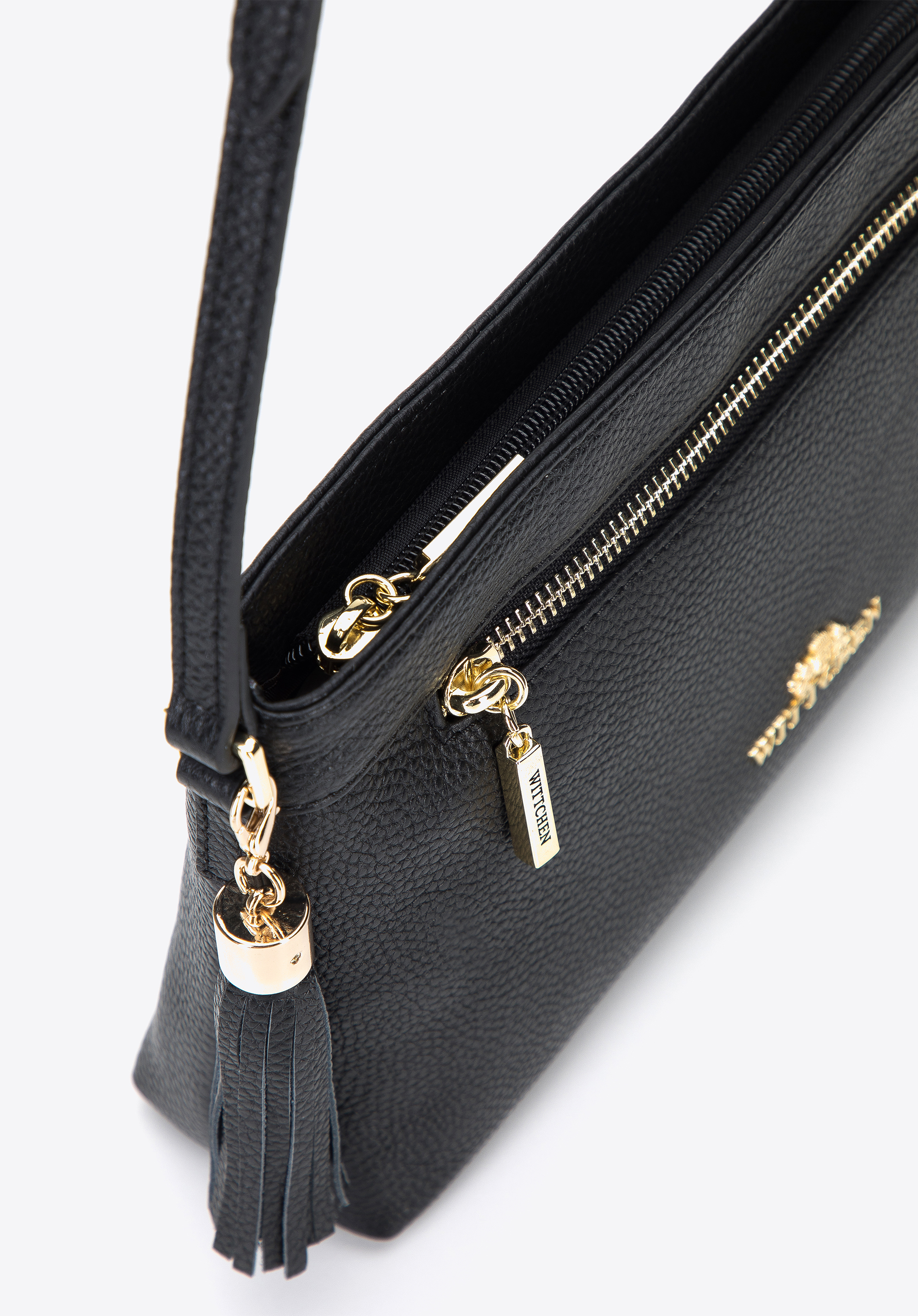 Damska listonoszka skórzana podłużna z chwostem