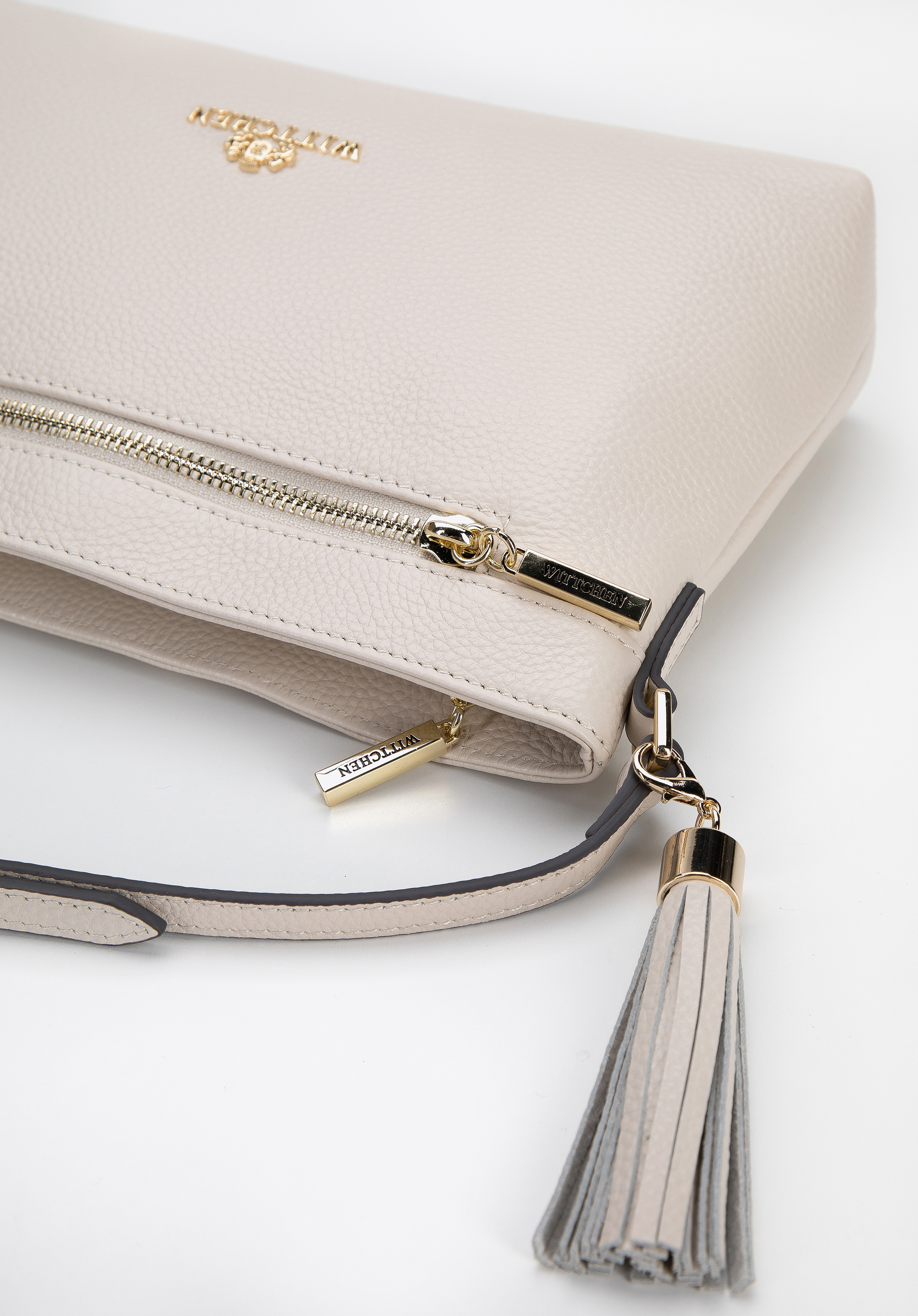 Damska listonoszka skórzana podłużna z chwostem