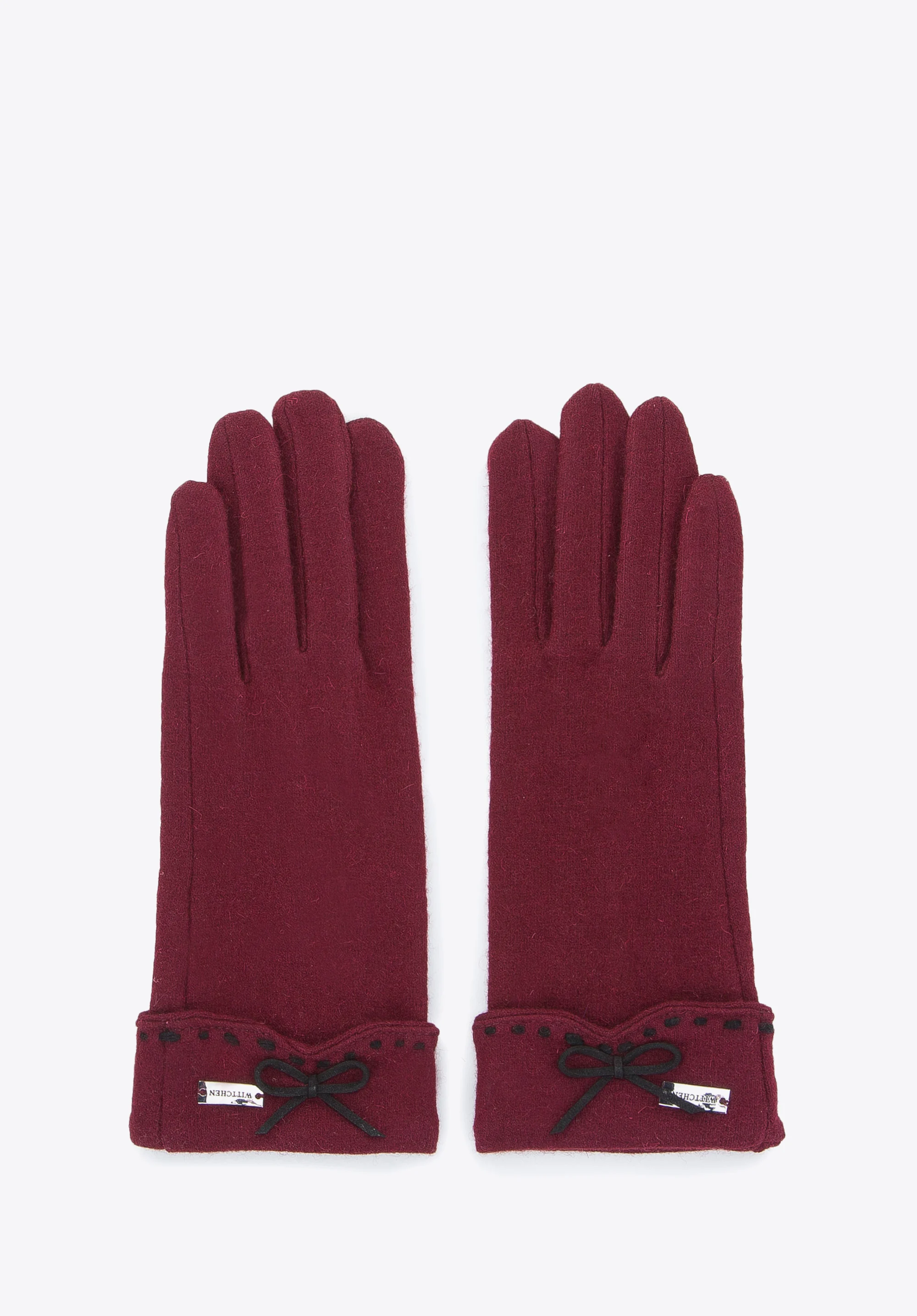 Damskie rękawiczki z ozdobnym przeszyciem i kokardką