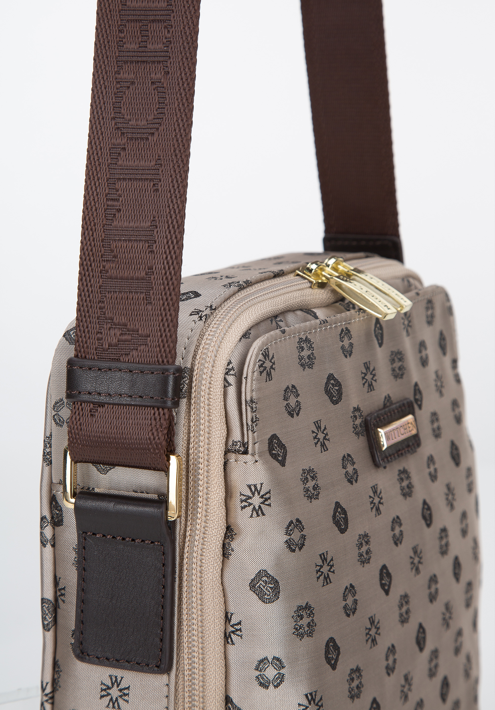 Damska torebka żakardowa z opaskami ze skóry pionowa