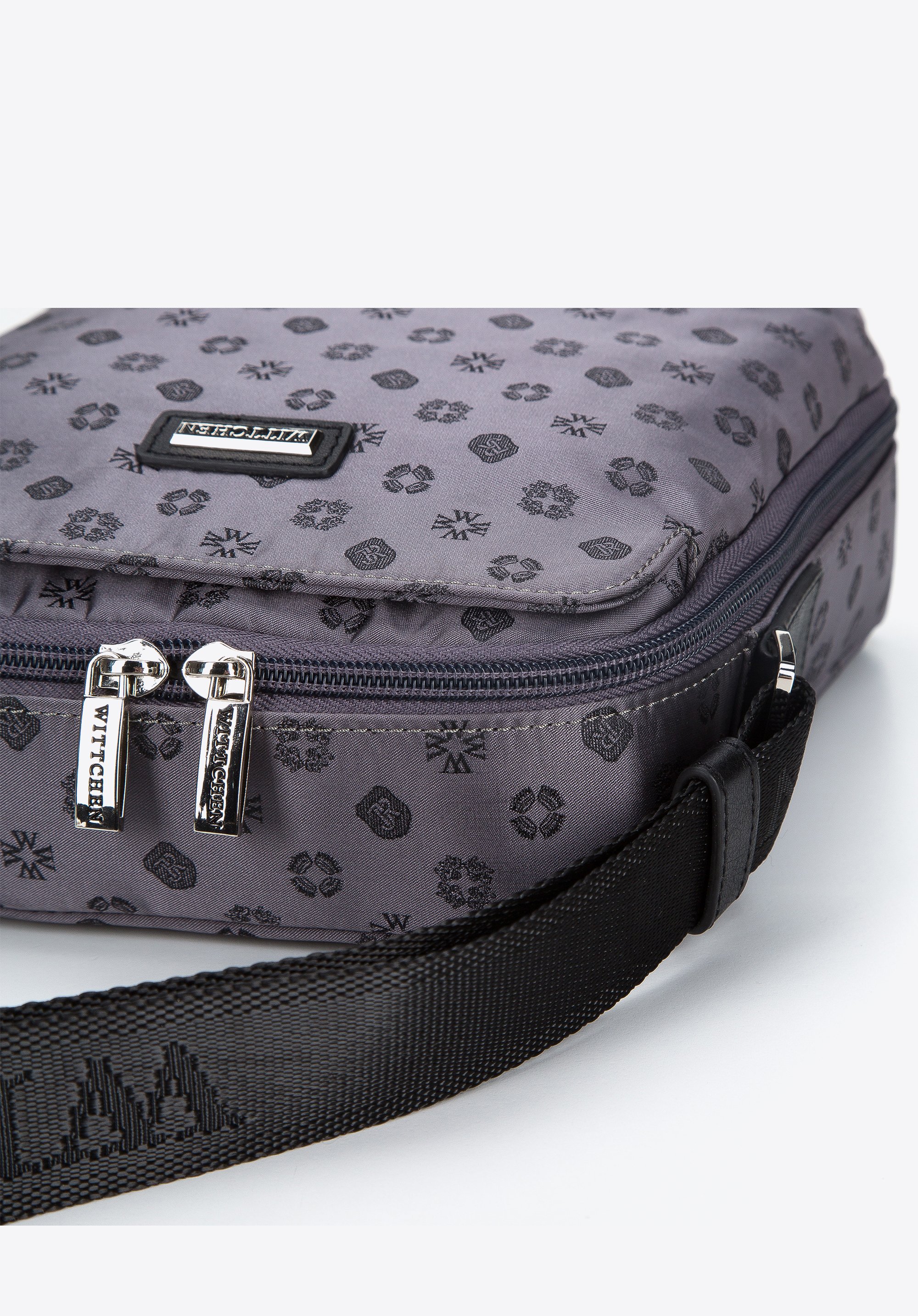 Damska torebka żakardowa z opaskami ze skóry pionowa