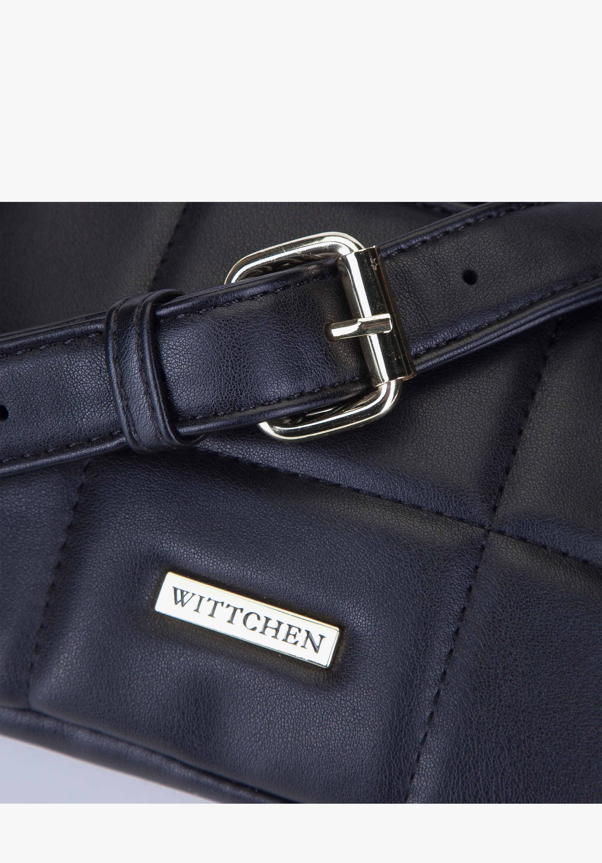 Damska torebka nerka z geometrycznym pikowaniem