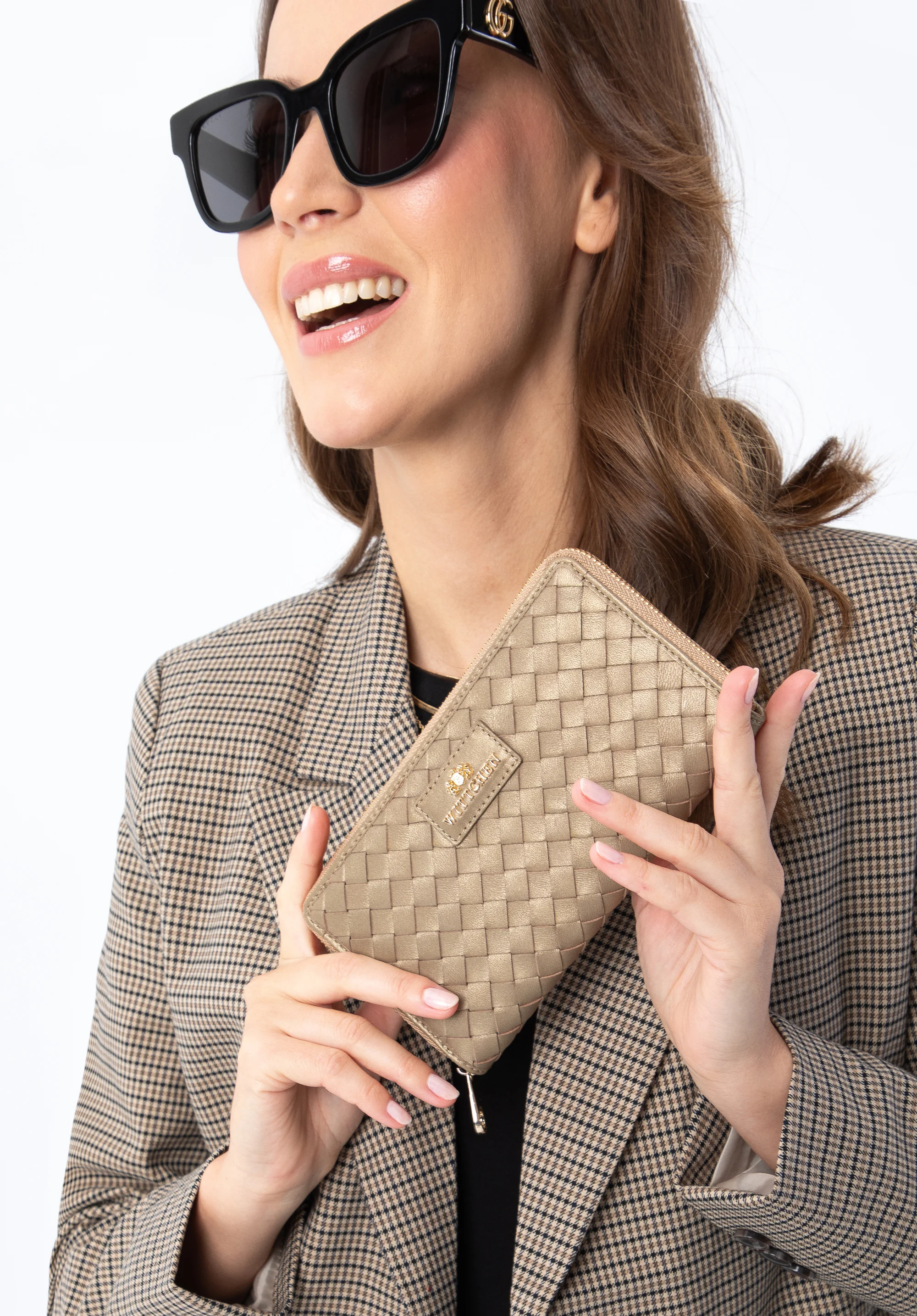 Damski portfel ze skórzanej plecionki duży