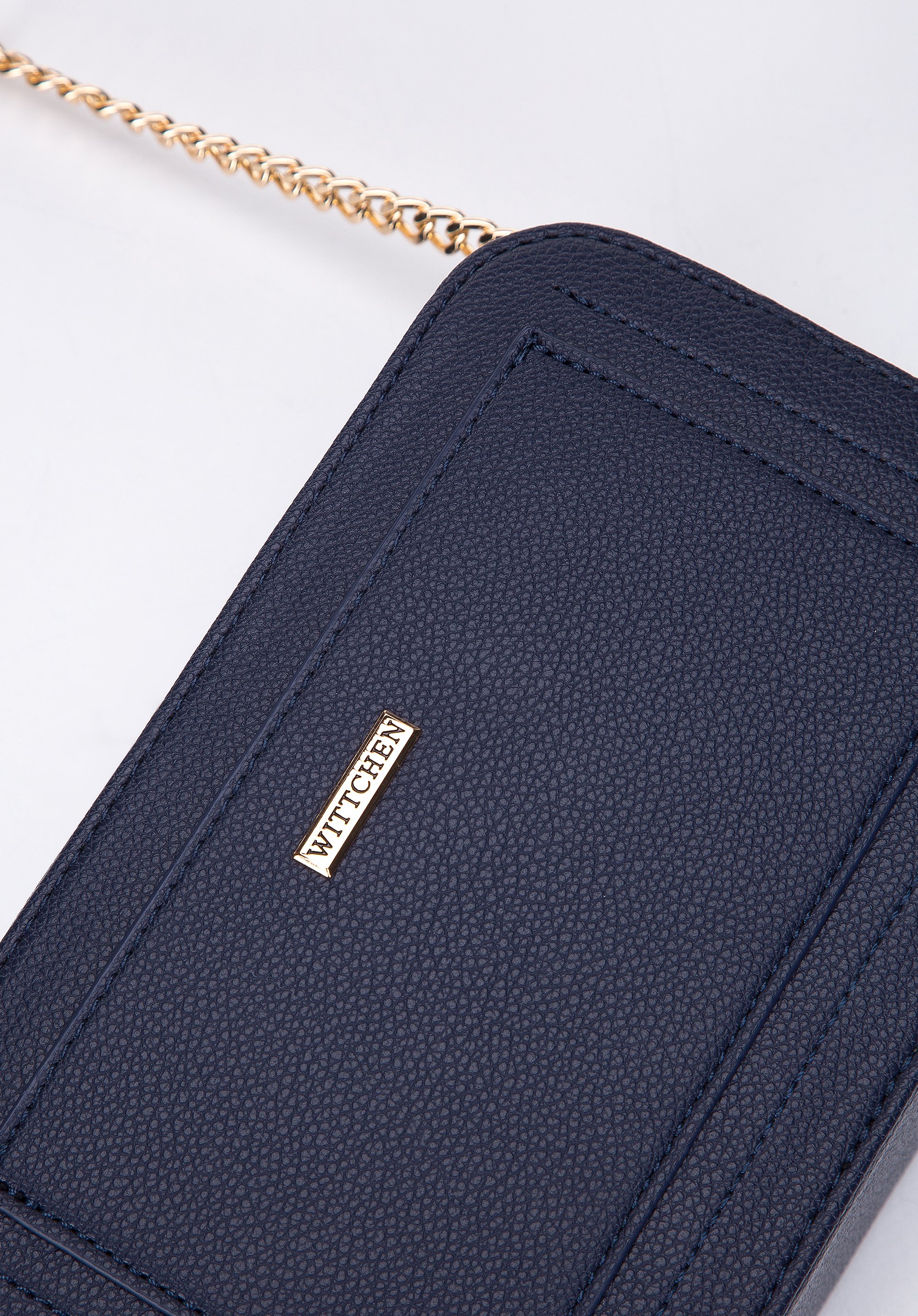 Damska listonoszka pudełkowa z obszytą kieszenią