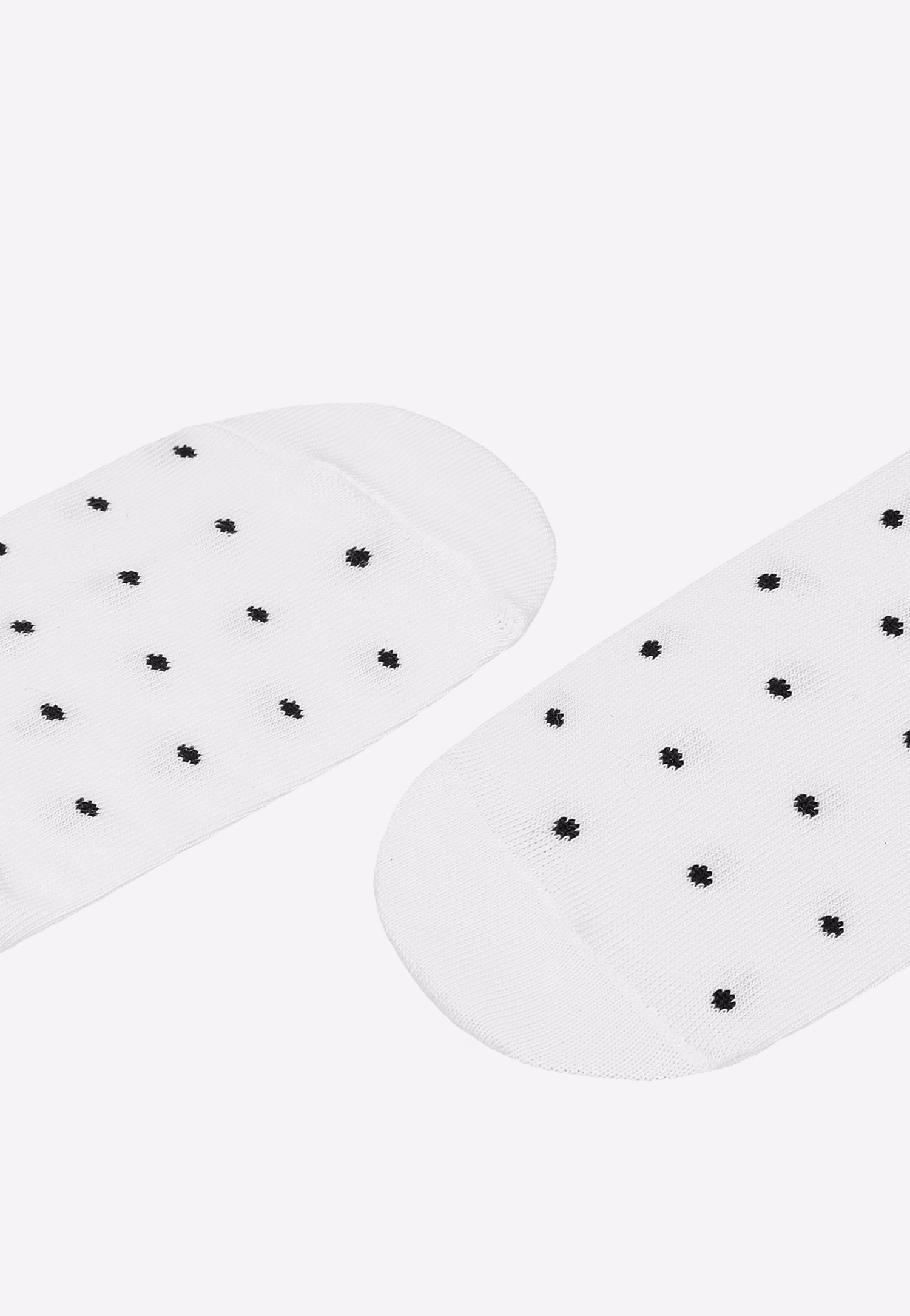 Białe stopki w czarne kropki