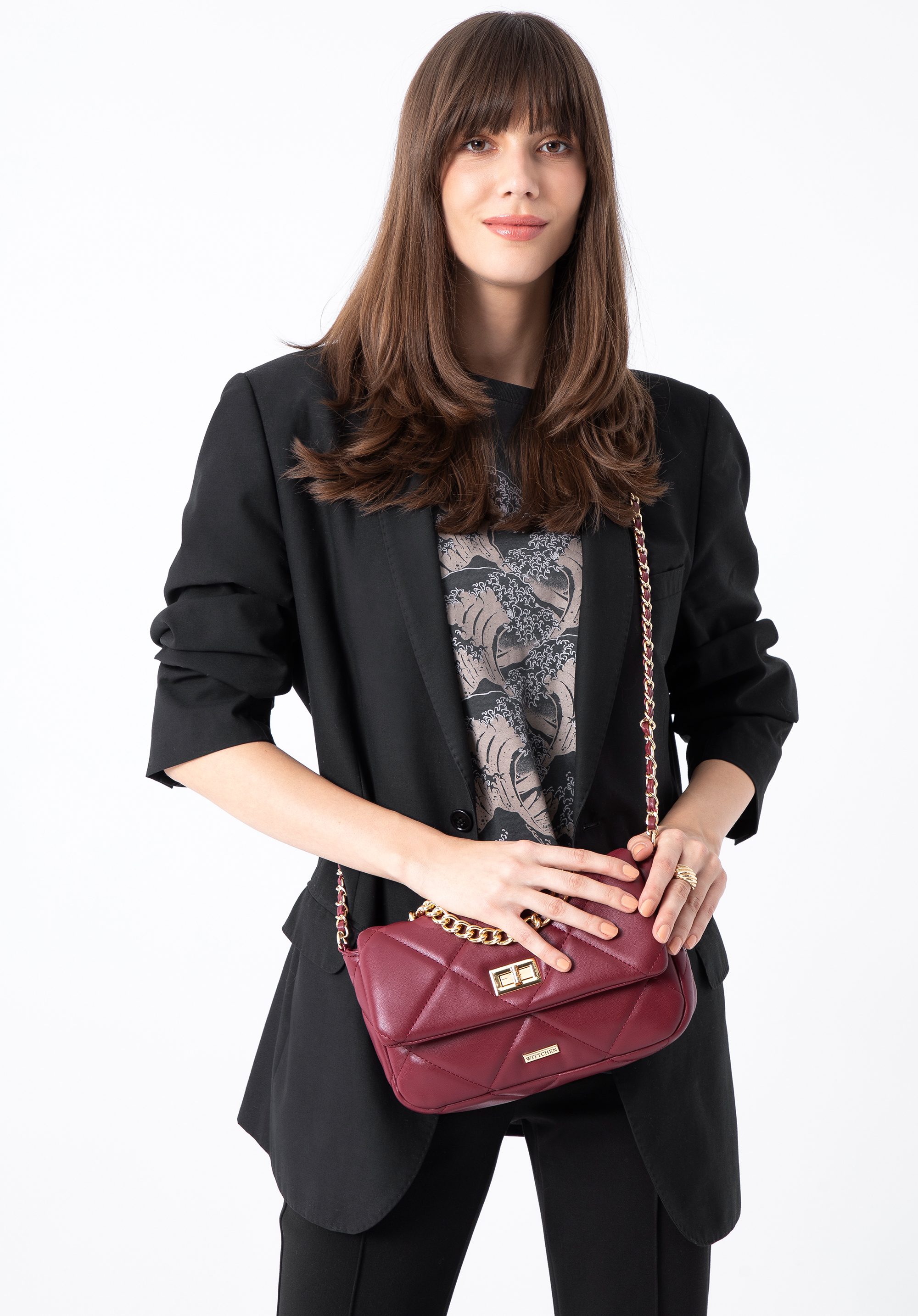 Damska torebka pikowana w kwadraty na łańcuszku mała