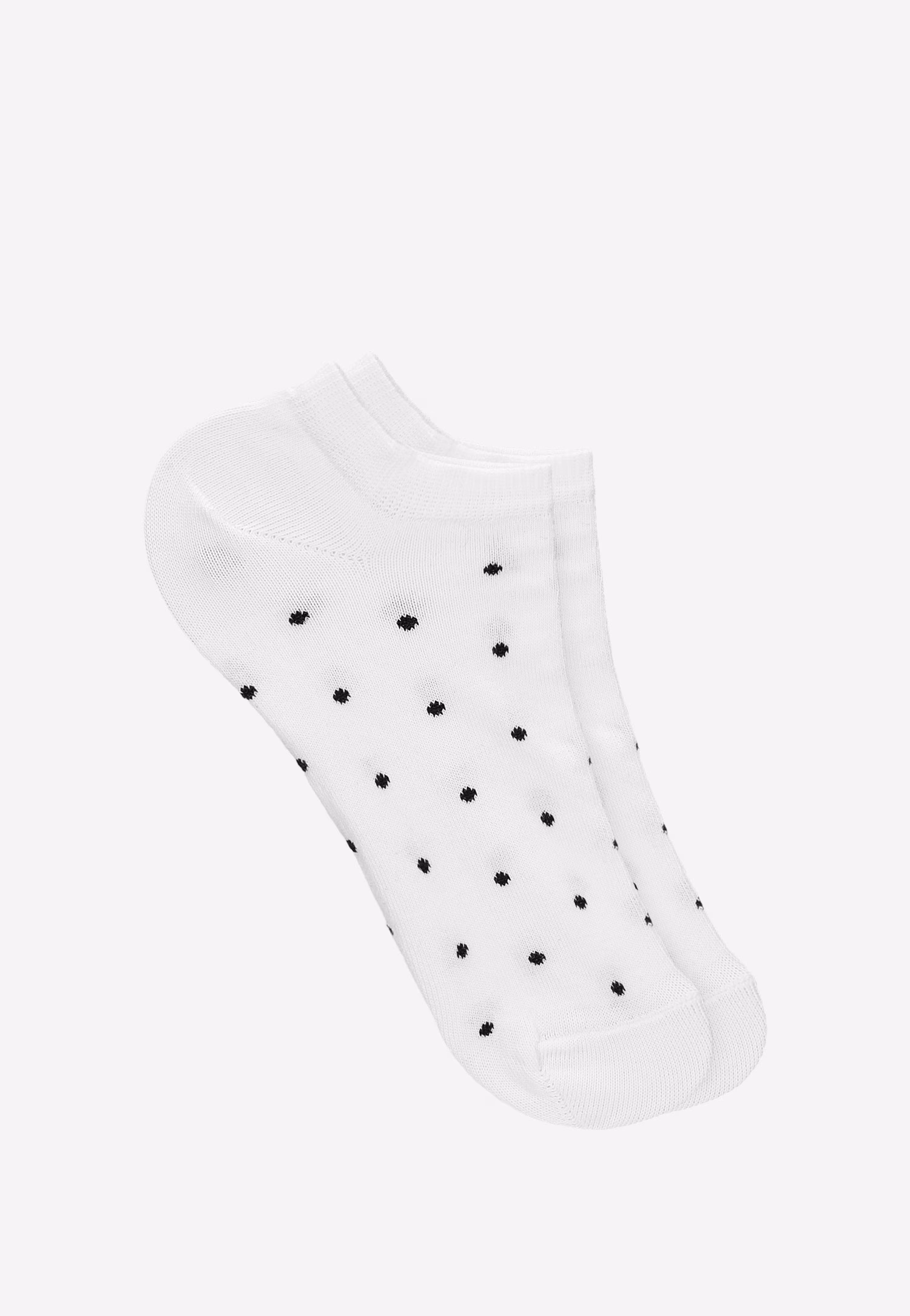 Białe stopki w czarne kropki