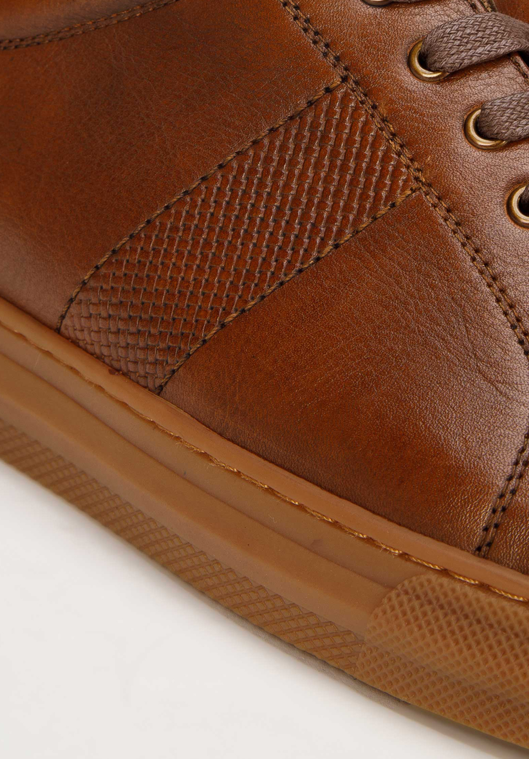 Męskie sneakersy skórzane z motywem plecionki po bokach