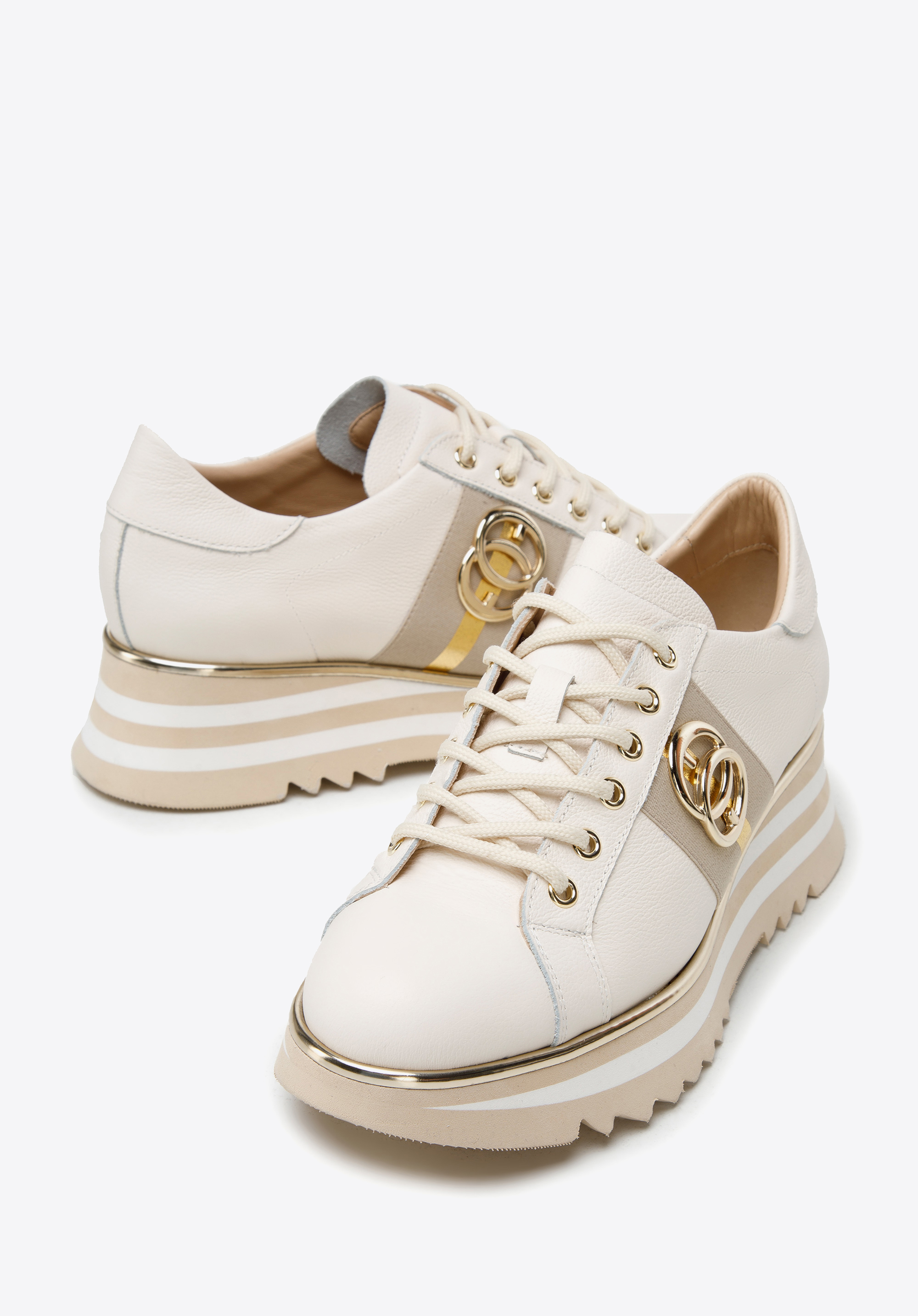 Damskie sneakersy skórzane z klamrą na platformie w pasy