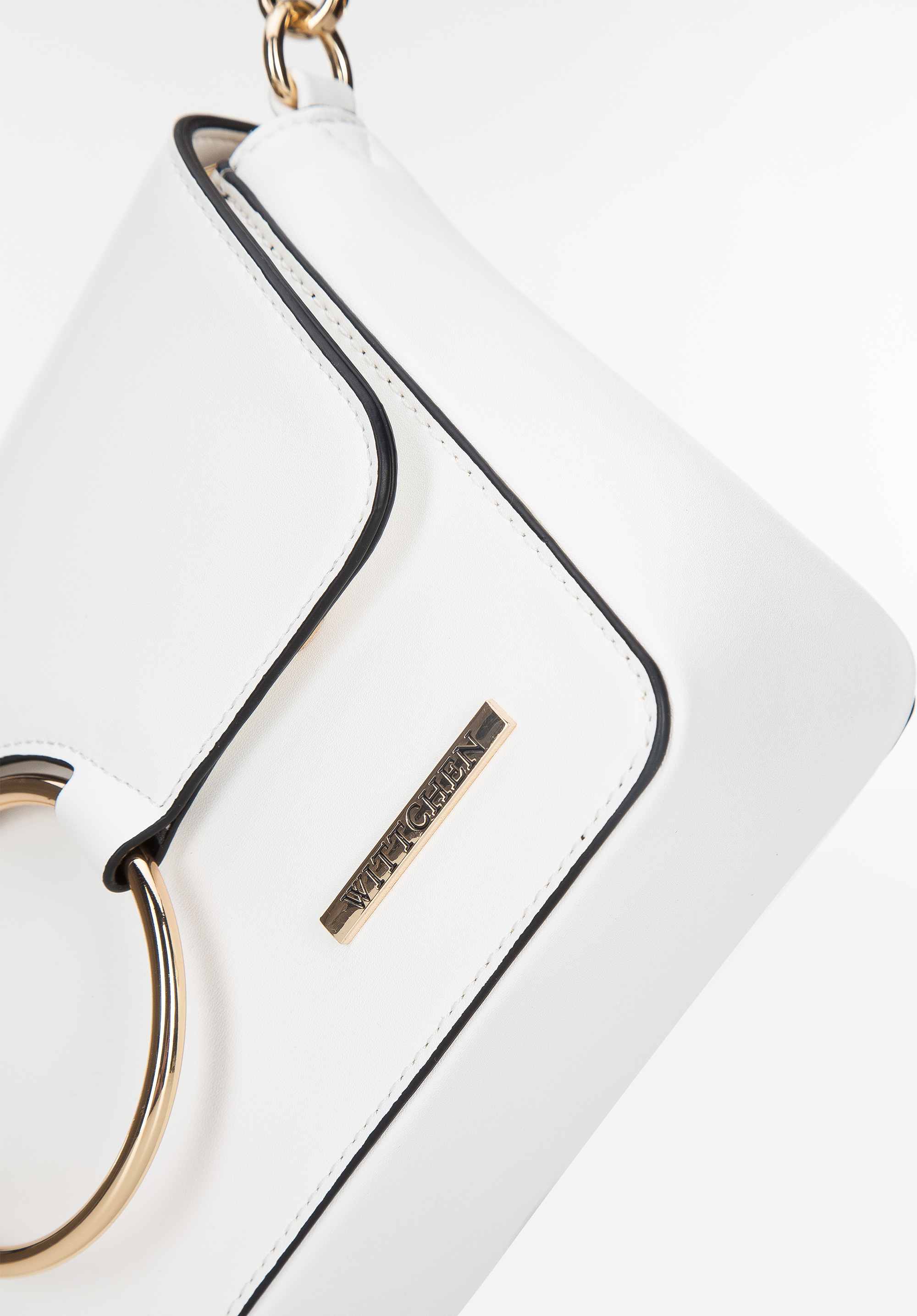 Damska torebka z kółkiem na klapie