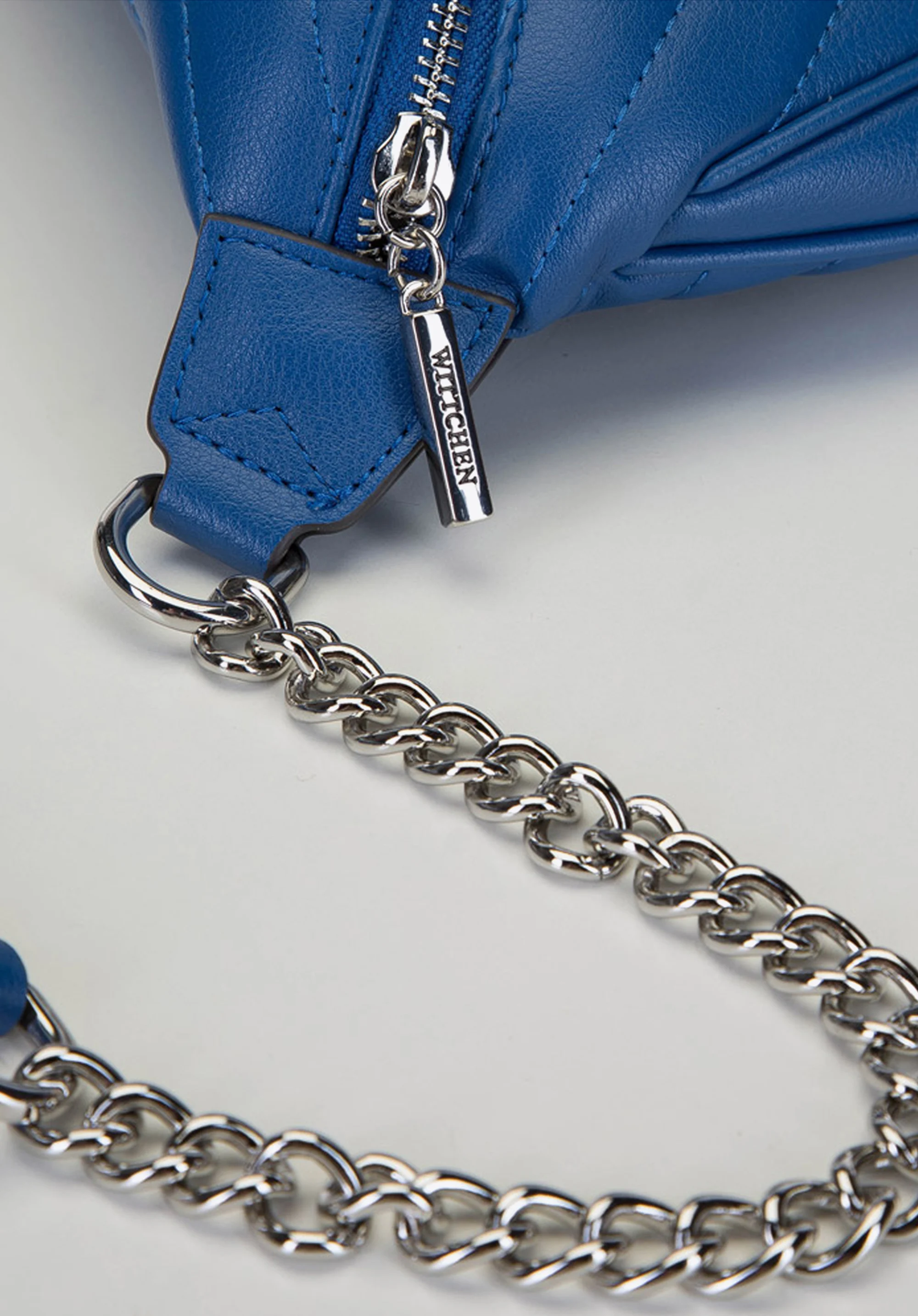 Damska torebka nerka skórzana z ukośnym pikowaniem